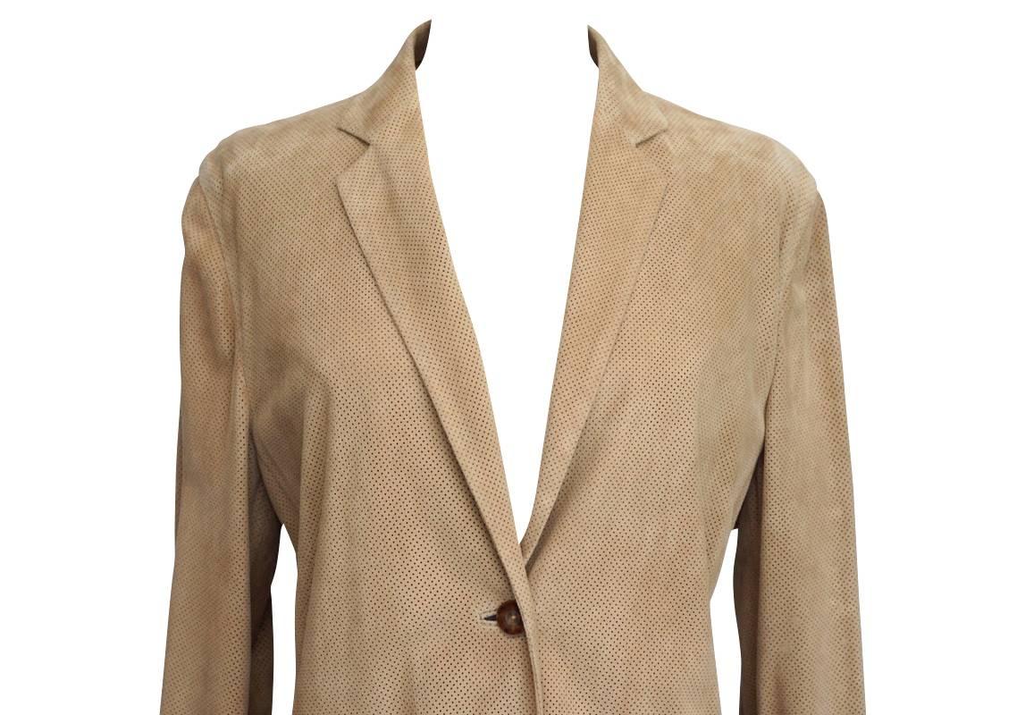 Guaranteed authentic Loro Piana glorious Lamb suede jacket that is SO light and soft you will think you are wrapped in a cloud!  
Gorgeous warm toasted beige - divine for any skin tone.
The entire jacket has small perforated holes and is unlined.