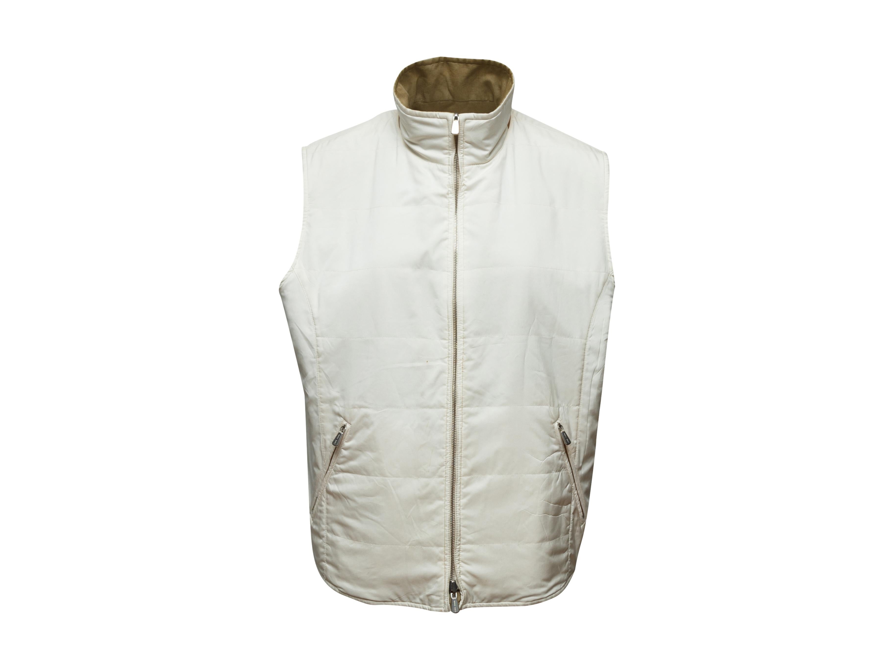 Product details: Khaki and white reversible vest by Loro Piana. High collar. Dual pockets. Zip closure at center front. 44