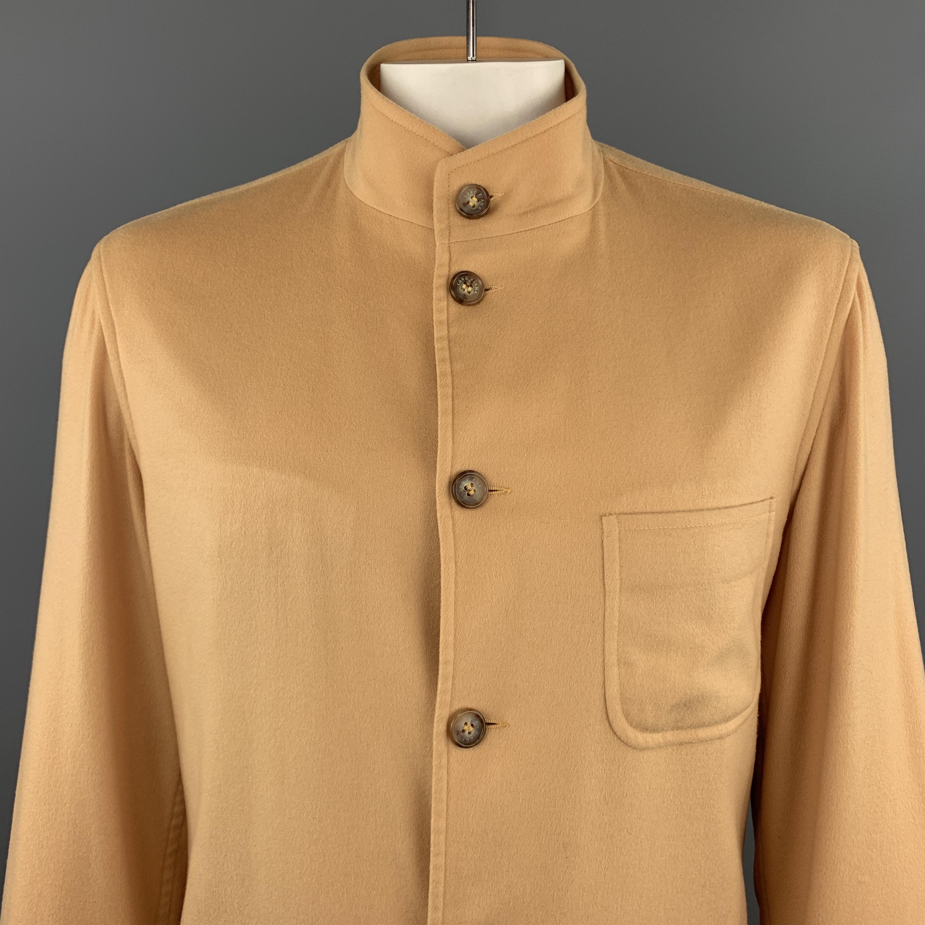 Vintage LORO PIANA jacket comes in soft khaki cashmere with a Nehru collar, button up front, and patch pockets. Made in Italy.
 
Excellent Pre-Owned Condition.
Marked: EU 40
 
Measurements:
 
Shoulder: 20 in.
Chest: 48 in.
Sleeve: 24 in.
Length: 32