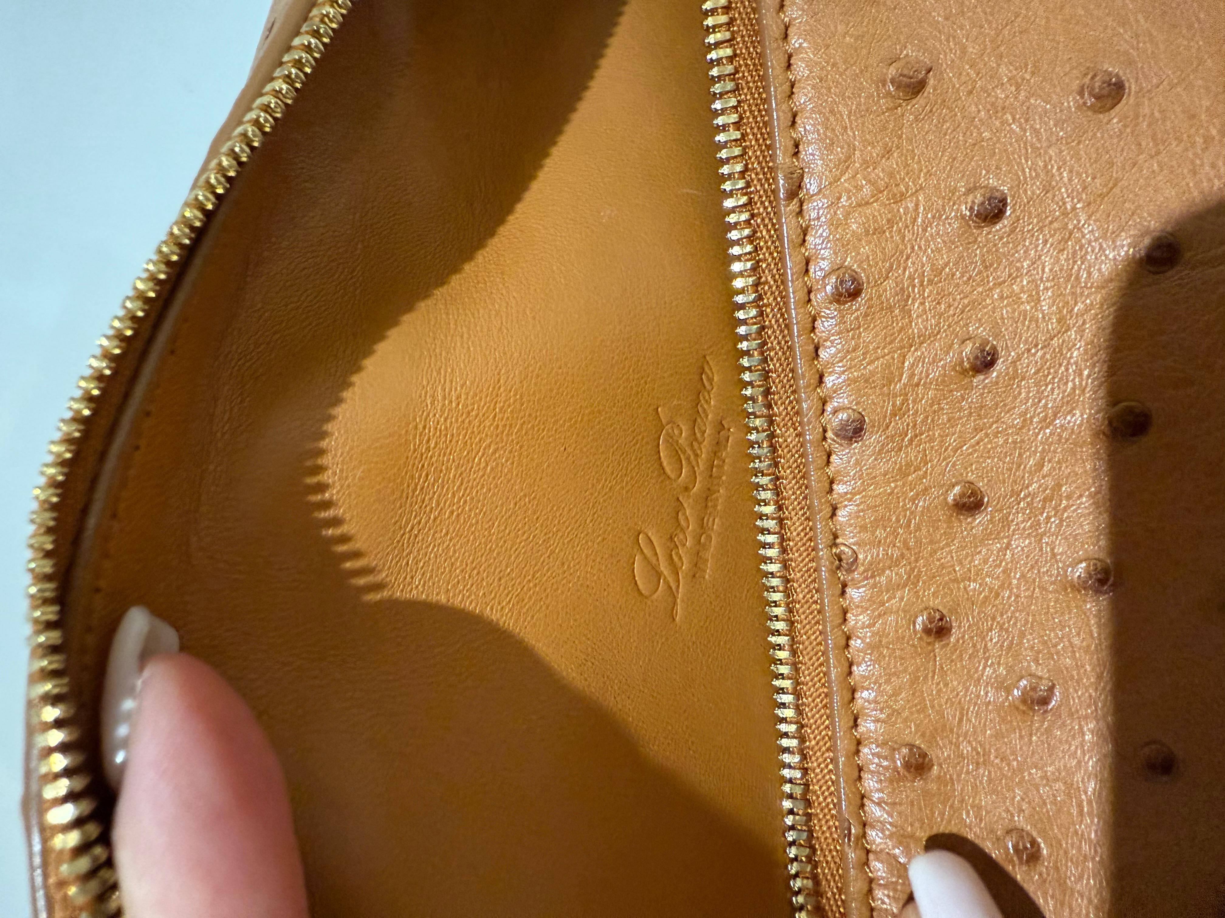 Loro Piana LP 19 in ostrich tan colour clutch In Good Condition For Sale In London, England