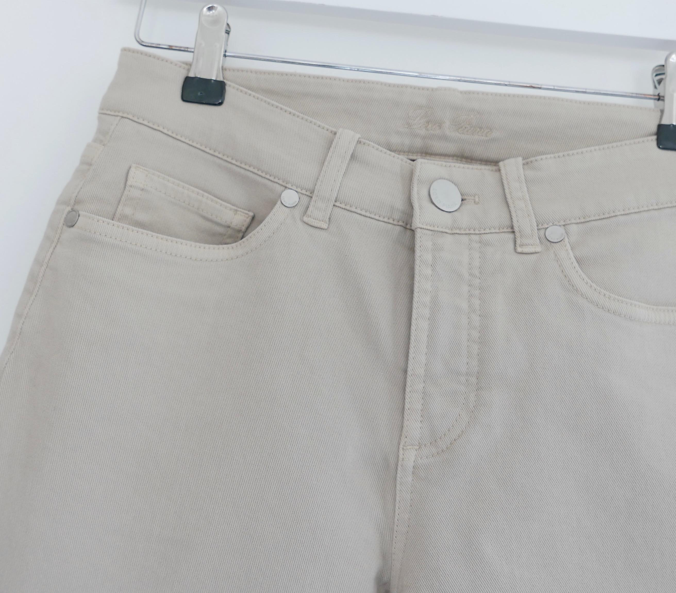 Classic luxe Loro Piana Mathias Light Denim trousers. Bought for £795 and new with tag. Made from mid weight beige cotton denim (with 2% polyamide), they have straight legs with tapered, ankle length hems, 5 pockets and etched matte silver tone