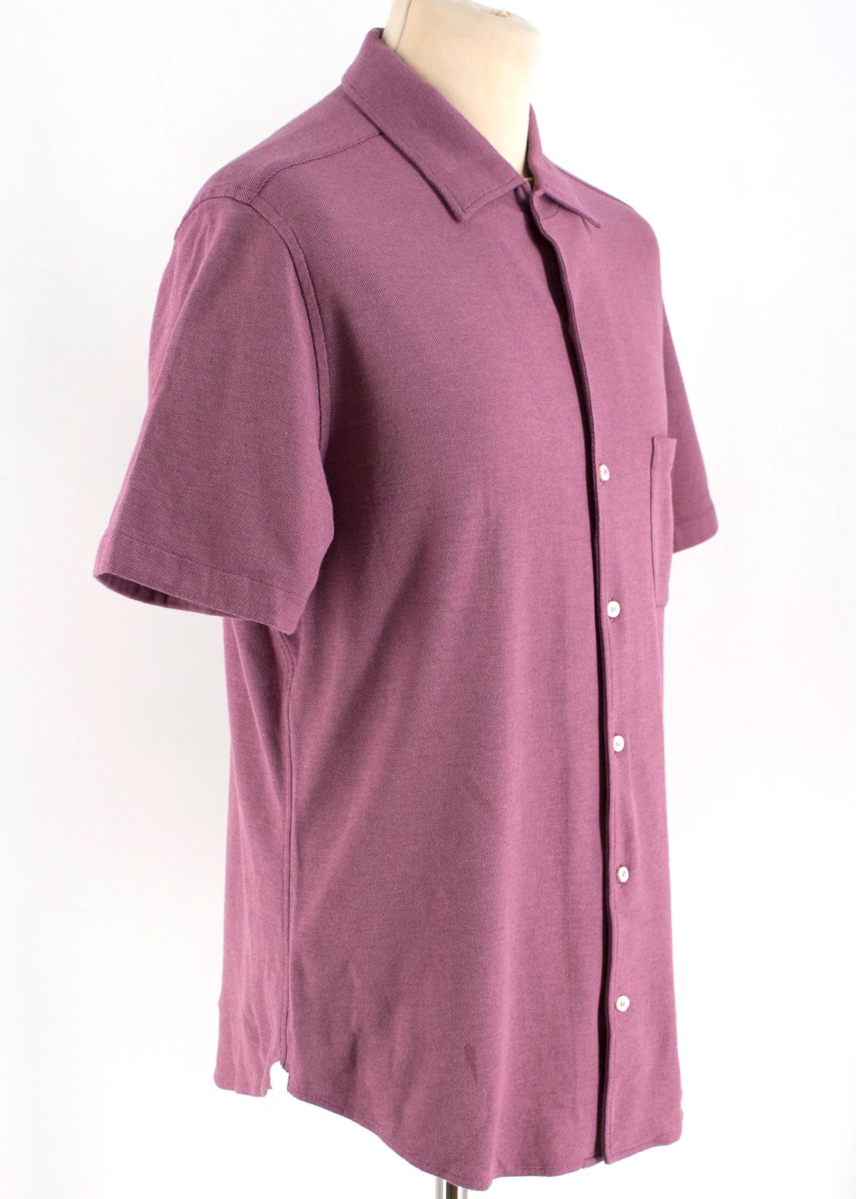 Loro Piana Men's Cotton Polo Shirt

- Pink cotton polo shirt
- Centre-front button fastening
- Chest patch pocket
- Short sleeves
- Narrow collar

Please note, these items are pre-owned and may show some signs of storage, even when unworn and