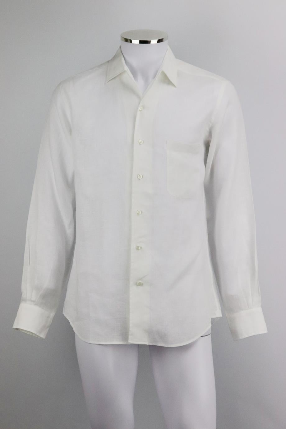 Loro Piana men’s linen shirt. White. Long sleeve, v-neck. Button fastening at front. 100% Linen. Size: Medium (IT 48, UK/US Chest 38, UK/US Collar 15.5). Shoulder to shoulder: 18 in. Chest: 41 in. Waist: 39 in. Hips: 42 in. Length: 30 in. Sleeve