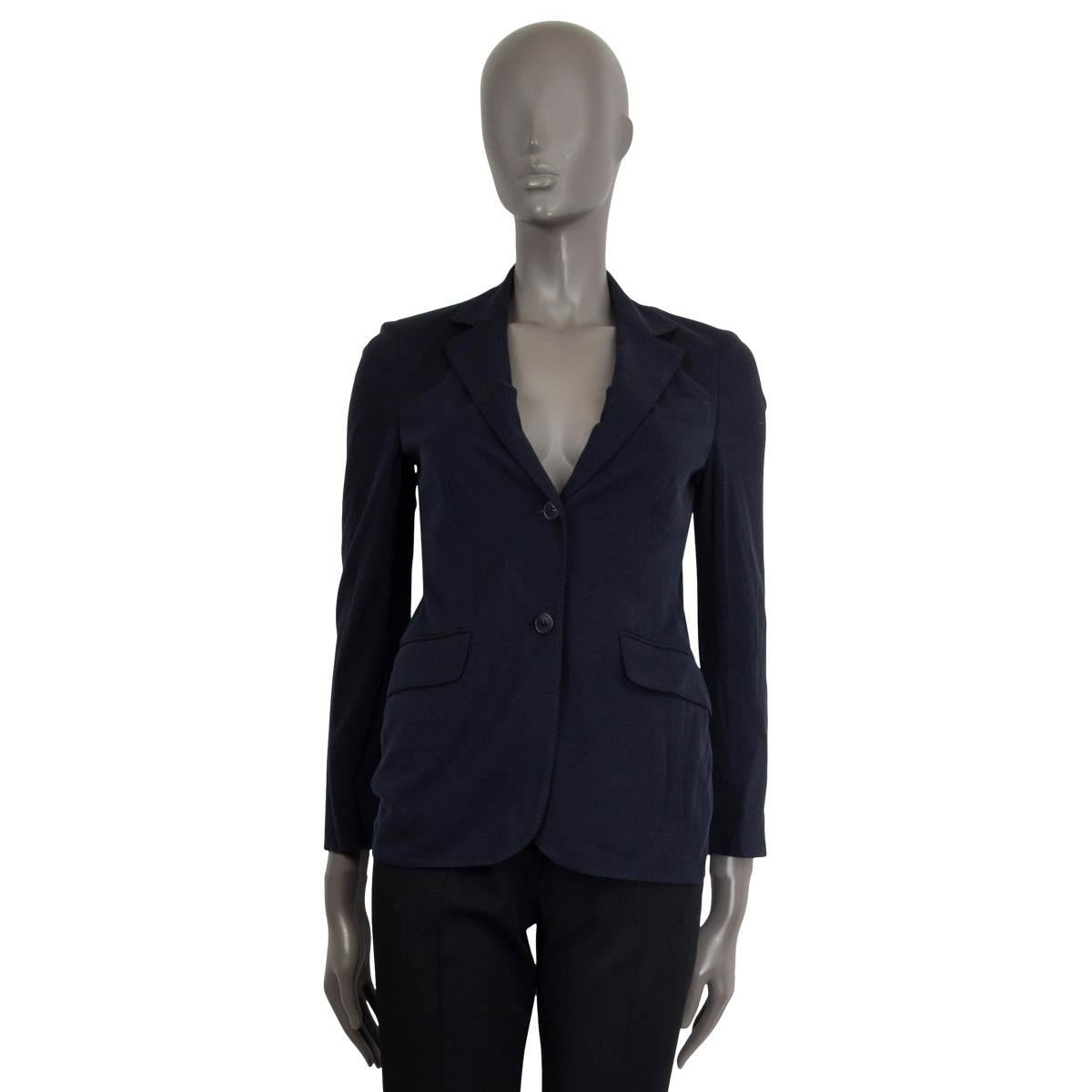 100% authentic Loro Piana blazer in midnight blue cotton (51%), silk (32%) and linen (16%). Comes with shoulder pads and three pockets on the front. Opens with two buttons on the front. Lined in silk (92%) and elastane (8%). Has been worn and is in