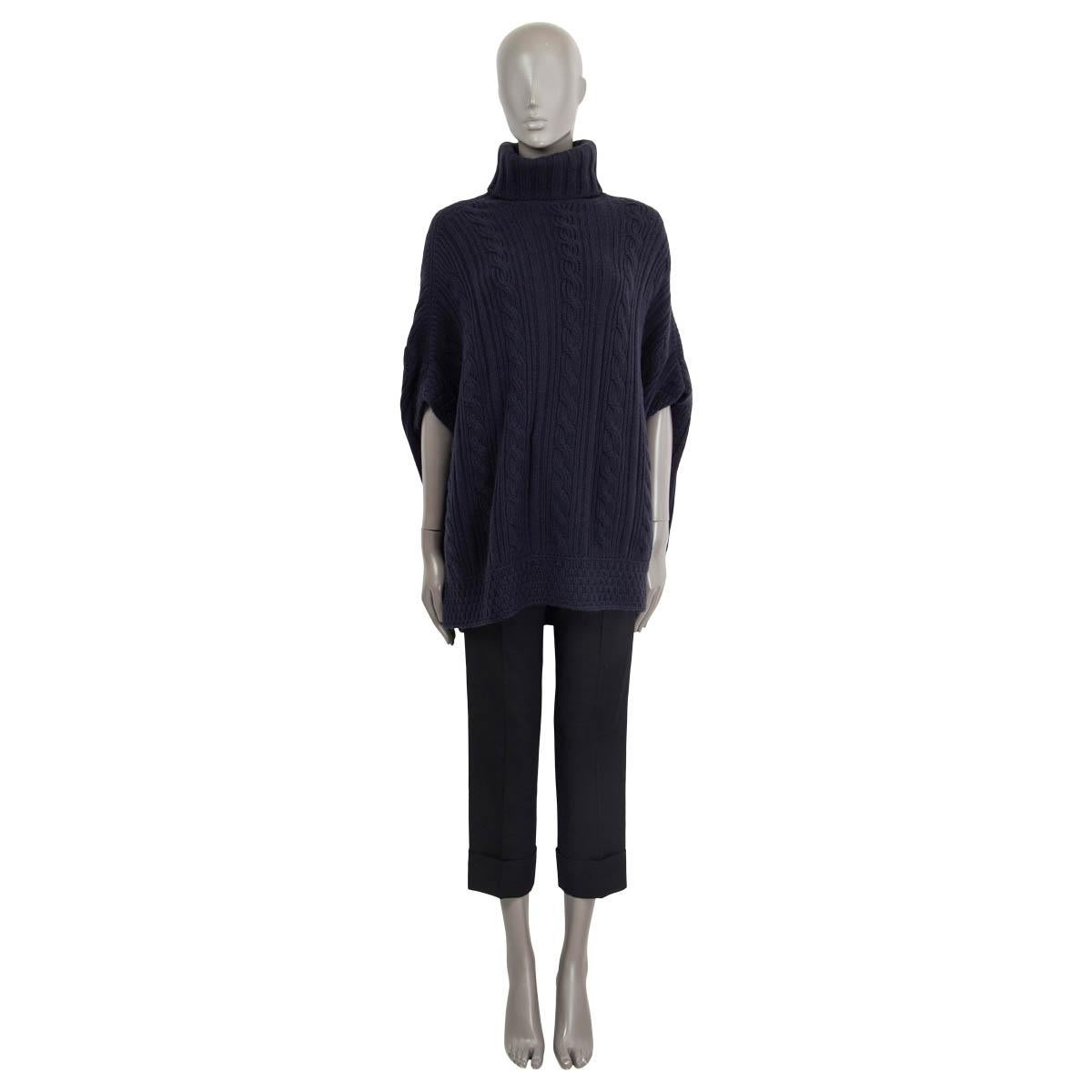 100% authentic Loro Piana oversized turtleneck cable knit poncho sweater in navy blue cashmere (100%). Has been worn and is in excellent condition. 

Measurements
Tag Size	42
Size	M
Shoulder Width	160cm (62.4in)
Bust From	170cm (66.3in)
Waist