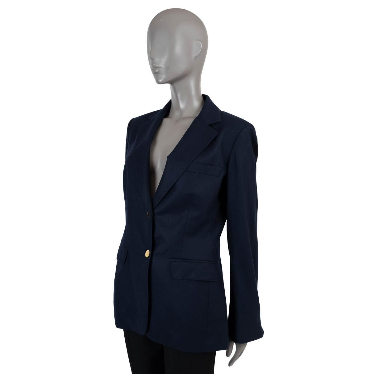 100% authentic Loro Piana blazer in navy blue cashmere (100%). Features peak lapels, two flap pockets and shoulder pads. Closes with gold-tone logo buttons and is lined in silk (100%). Has been worn and is in excellent condition.