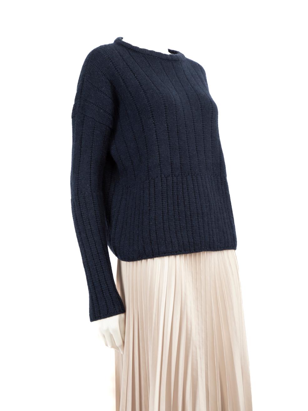 CONDITION is Very good. Minimal wear of the jumper is evident. The seam on the inside of the neckline has come apart, there is also overall mild pilling on this used Loro Piana designer resale item.
 
 Details
 Navy
 Cashmere
 Knit jumper
 Long