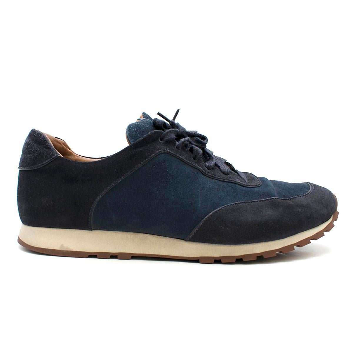 Loro Piana Navy Weekend Walk Suede Sneakers

- Navy suede sneakers
- Treated with a light water-repellent, stain-resistant finish
- Front lace up
- Brown leather lining with logo embroidered
- Microporous sole with light rubber tread featuring the