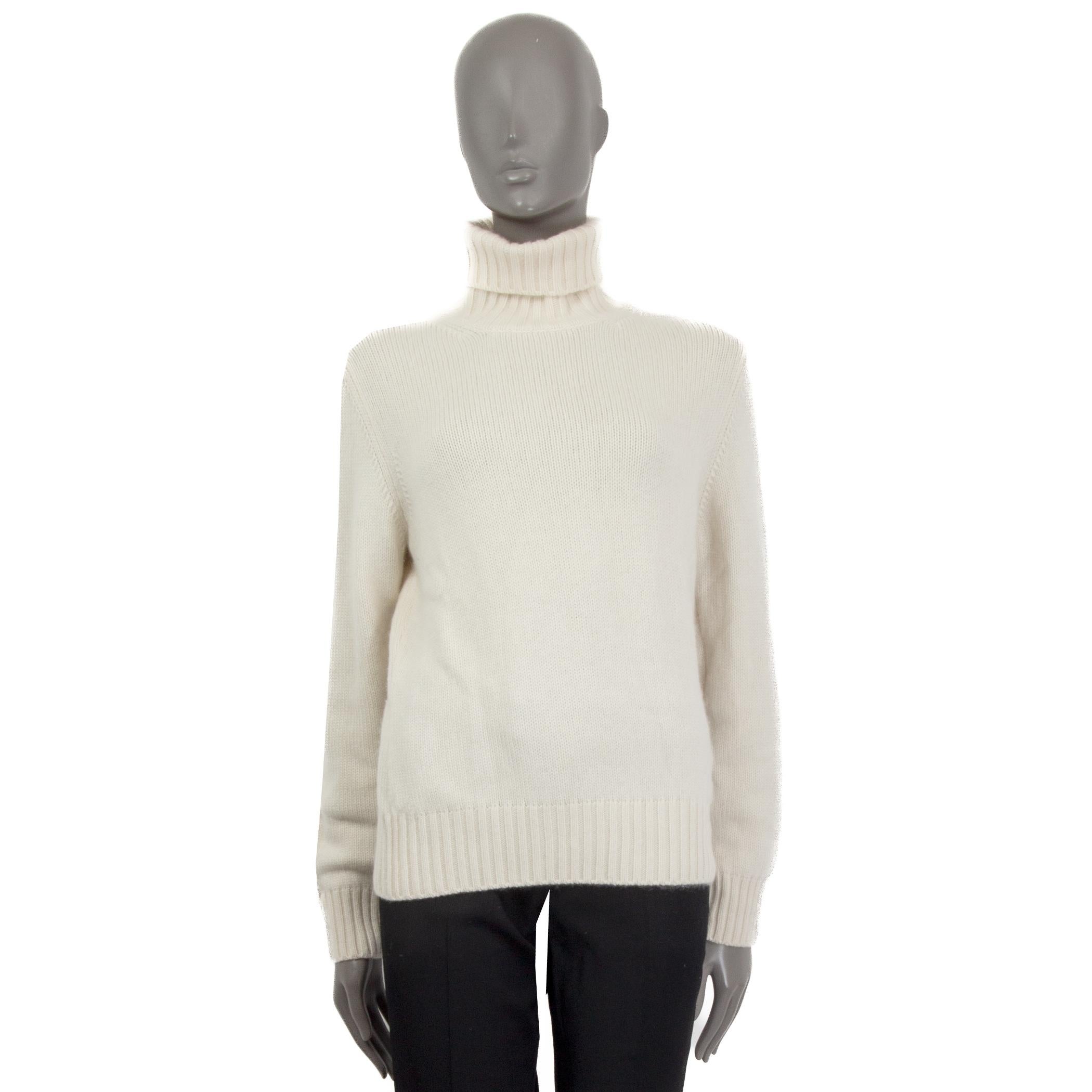 100% authentic Loro Piana turtleneck knit sweater in off-white cashmere (100%). Features long sleeves, a ribbed hemline and ribbed cuffs. Unlined. Has been worn and is in excellent condition.

Measurements
Tag Size	46
Size	XL
Shoulder Width	41cm