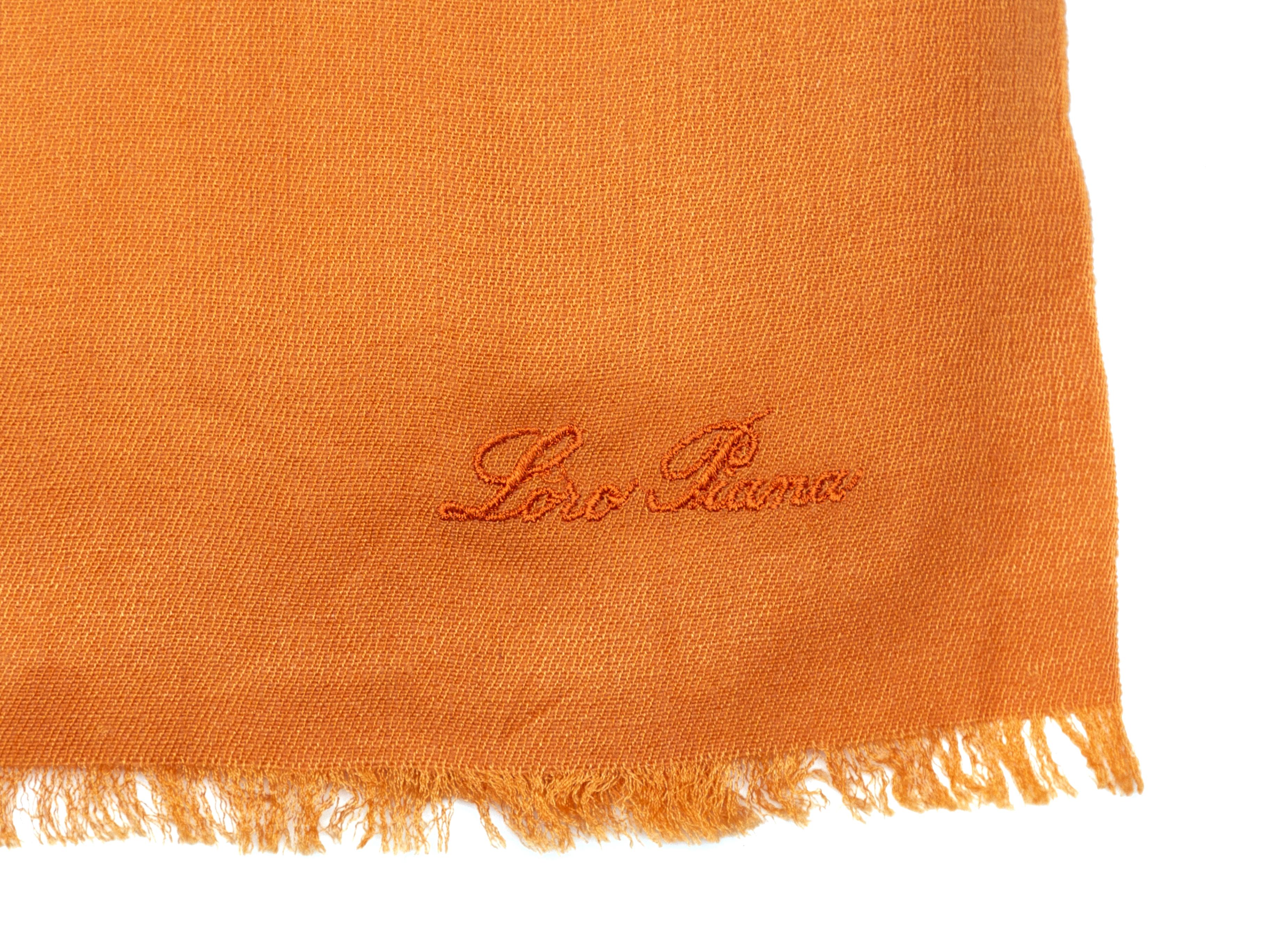 Product Details: Orange thin cashmere-blend scarf by Loro Piana. Fringe trim at ends. 86