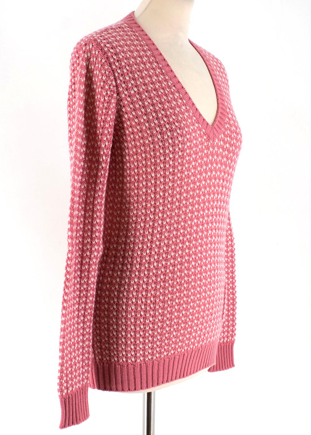 Loro Piana Pink and White Knitted Sweater 

- V Neckline 
- Straight Hemline 
- Ribbed Knit to cuffs, neckline and hemline 
- Small pocket detail to bottom left 

Made in Italy 
Measurements are taken laying flat, seam to seam. 

Length: