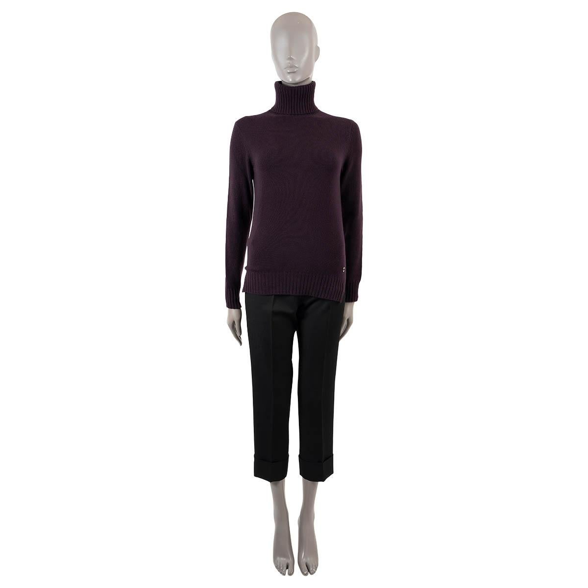 100% authentic Loro Piana Parksville turtleneck sweater in plum baby cashmere (100%). Features metal logo detail at the waist, a split hem, rib knit neck, cuffs and hem. Has been worn and is in excellent condition.

Measurements
Tag