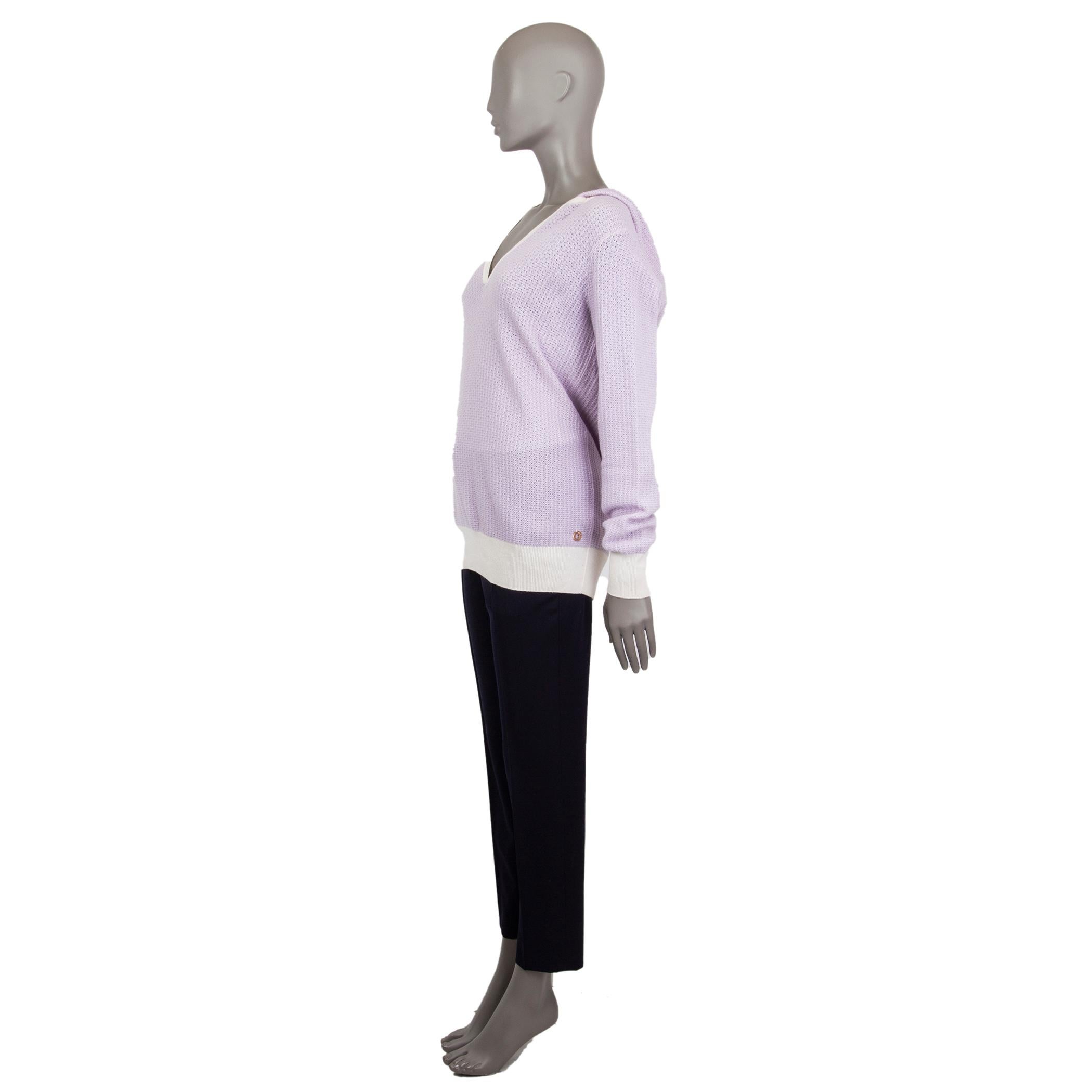 Loro Piana long-sleeve hooded sweater in lilac and off-white cashmere (100%) with a v-neck and elbow patches. Unlined. Has been worn and is in excellent condition. 

Tag Size 46
Size XL
Shoulder Width 46cm (17.9in)
Bust 98cm (38.2in) to 102cm