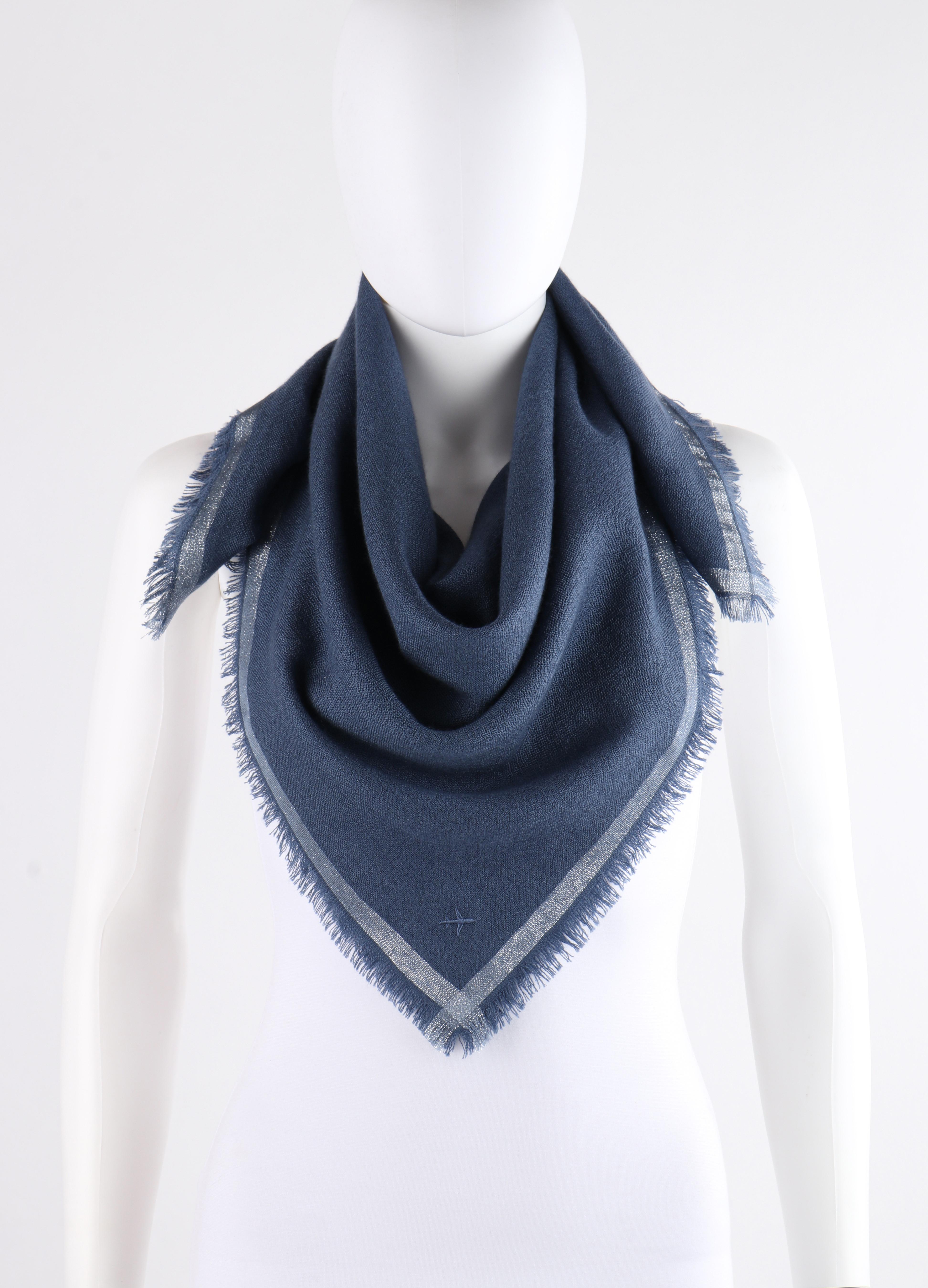 LORO PIANA “Quadrata Carre” Blue Silver Silk Cashmere Fringe Knit Travel Scarf
 
Estimated Retail: $ 900.00
 
Brand/Manufacturer: Loro Piana 
Style: Large square scarf
Color(s): Shades of blue and silver
Lined: No
Marked Fabric Content: “70%