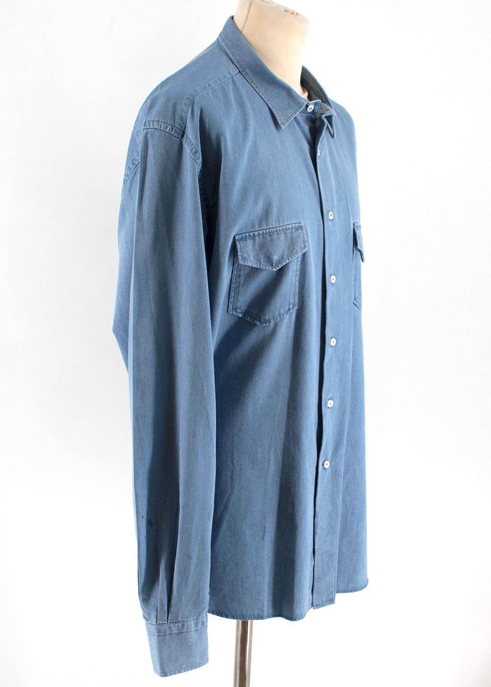Loro Piana Regular Fit Chambray Shirt

- Light blue chambray shirt
- Lightweight
- Regular fit
- Centre-front button fastening
- Pointed collar
- Chest flap pockets
- Buttoned cuffs
- Side logo patch

Please note, these items are pre-owned and may