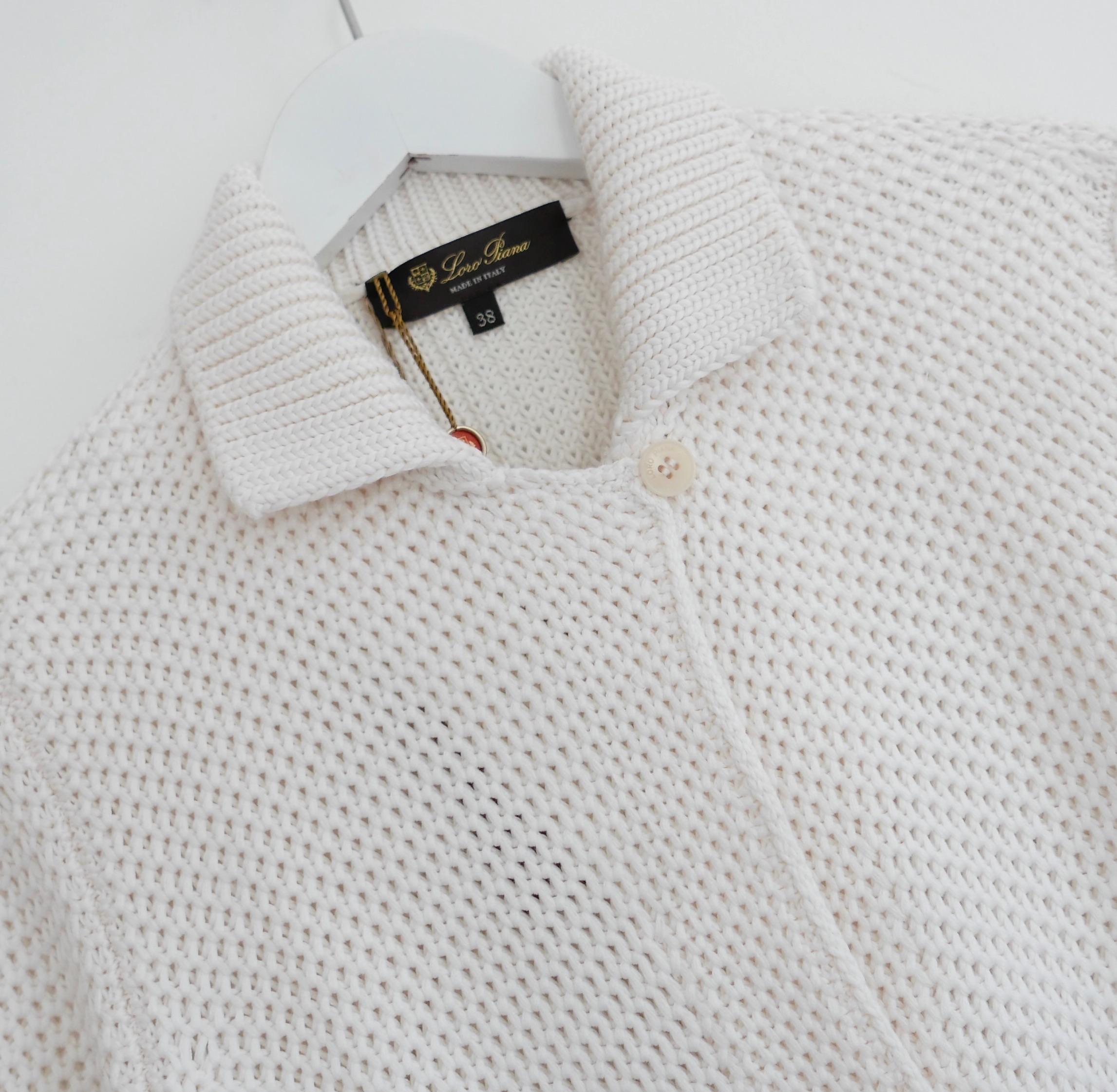 Divine Loro Piana Santiago silk and cotton-blend cardigan. Bought for £1950 and new with tag/spare button. Made from incredibly soft cream layered waffle knit silk and cotton, it has ribbed trims, patch pockets and large mother of pearl buttons.