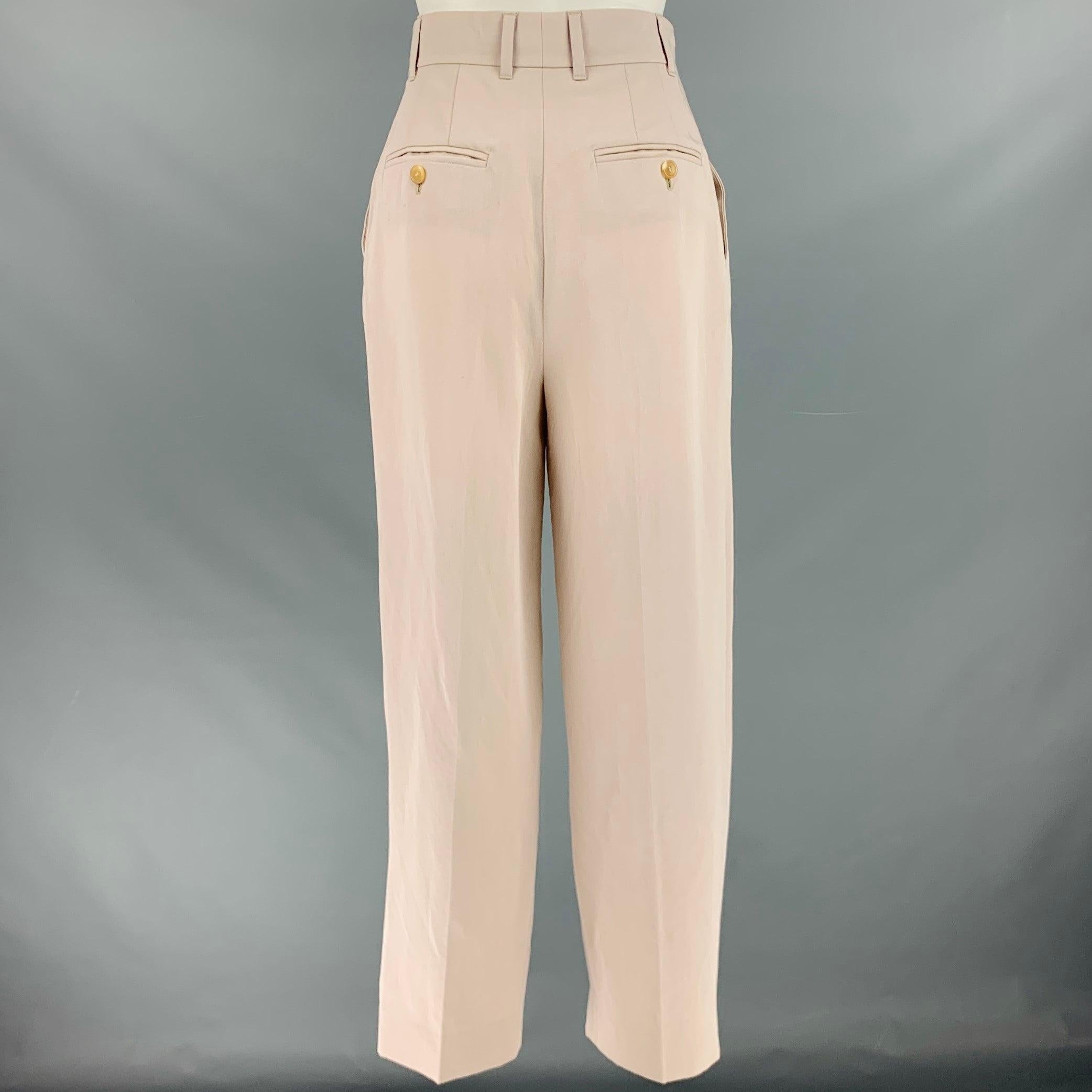 LORO PIANA dress pants
in a grey virgin wool blend fabric featuring a pleated style, high waist, wide leg, and button fly closure. Made in Italy.Excellent Pre-Owned Condition. 

Marked:   38 

Measurements: 
  Waist: 26 inches Rise: 13 inches