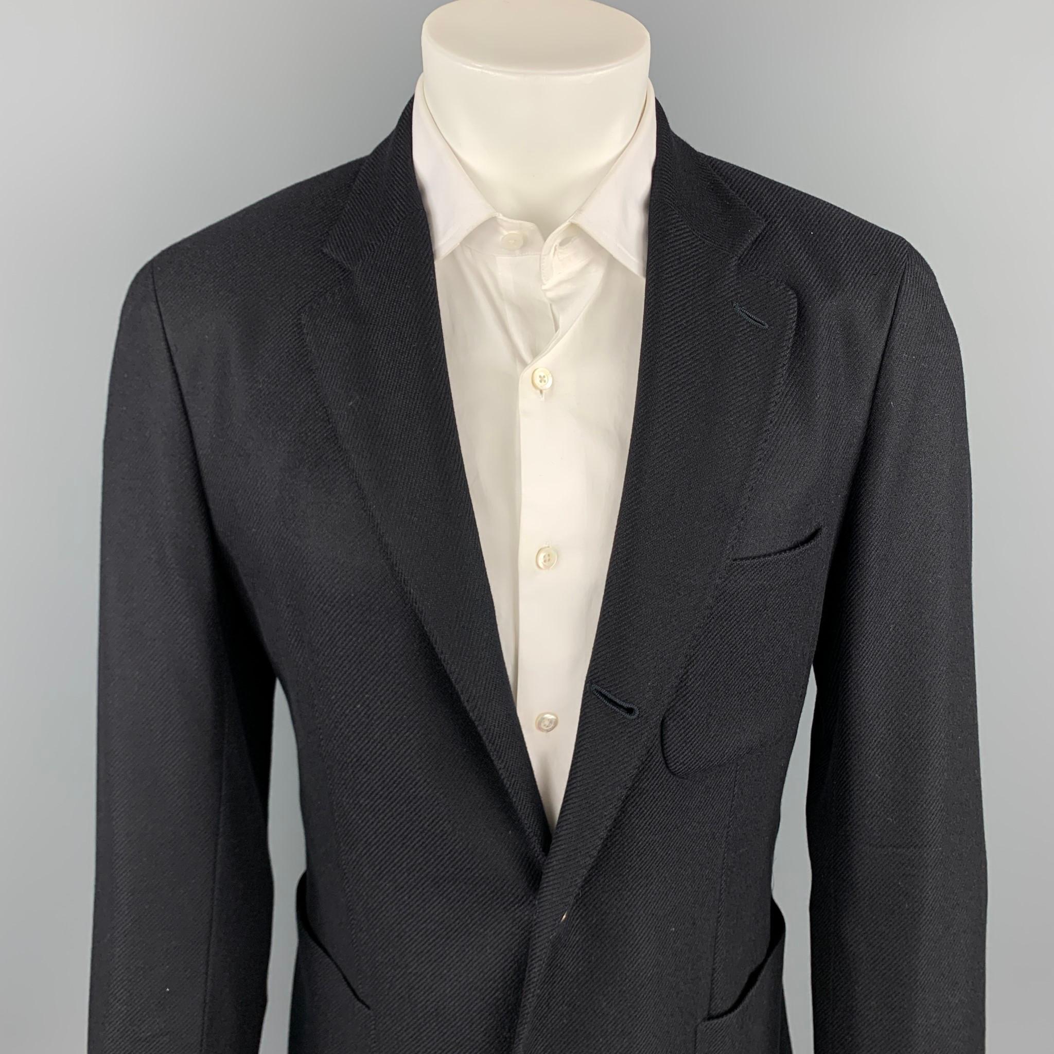 LORO PIANA sport coat comes in a black cashmere with a suede trim featuring a notch lapel, patch pockets, and a three button closure. Made in Italy.

Excellent Pre-Owned Condition.
Marked: IT 48

Measurements:

Shoulder: 18.5 in.
Chest: 38