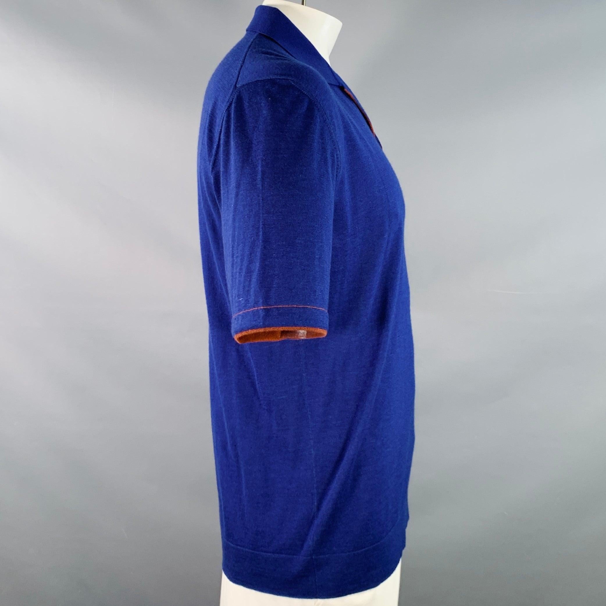 LORO PIANA polo
in a royal blue and brown silk cashmere featuring an open collar, short sleeves with contrast trim, and pullover closure.
Made in Italy.Excellent Pre-Owned Condition. 

Marked:   IT 52 

Measurements: 
 
Shoulder: 19 inches  Chest: