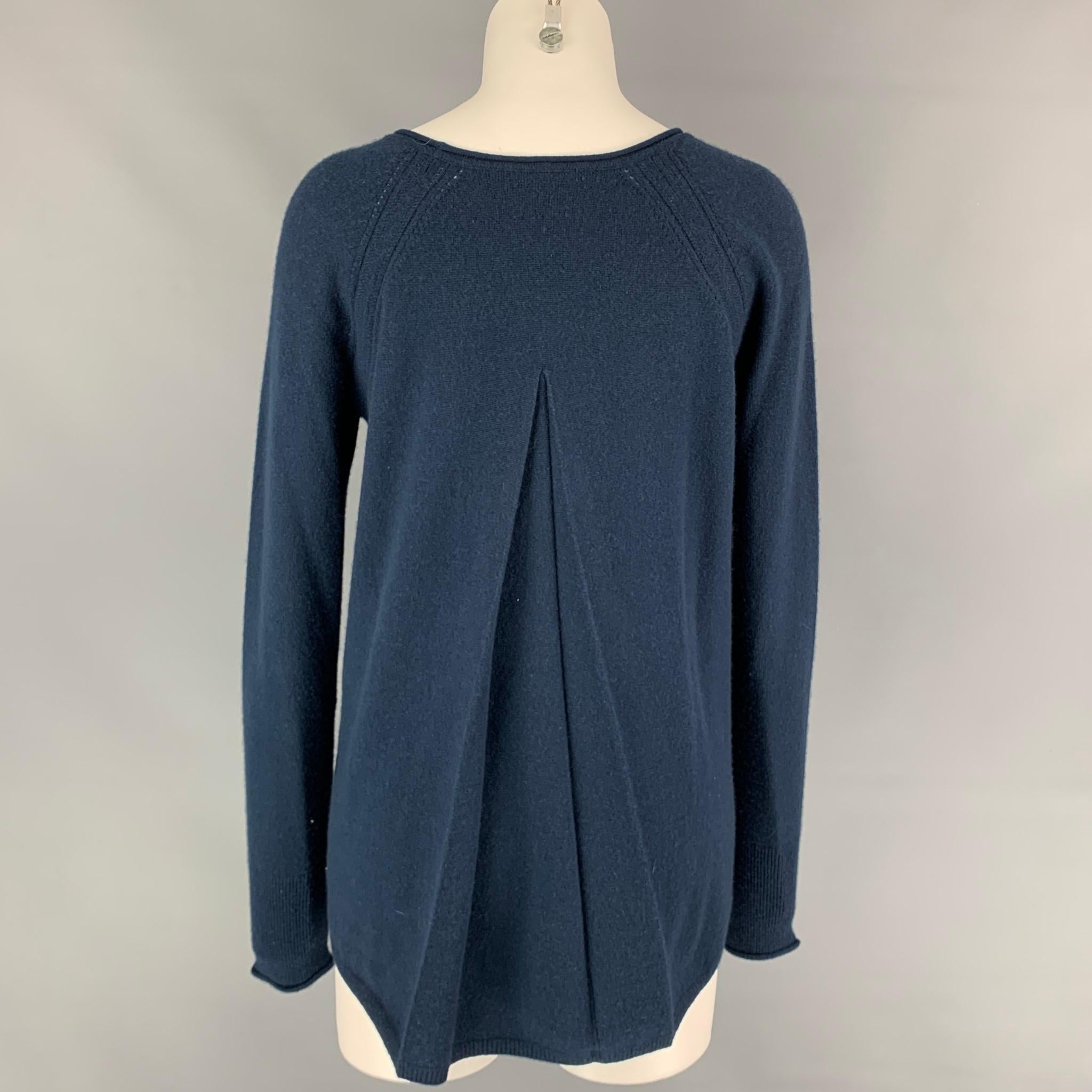 LORO PIANA pullover sweater comes in a navy cashmere featuring an a-line fit, long sleeves, and a crew-neck. Made in Italy.  Retail $1200.

Very Good Pre-Owned Condition.
Marked: 42

Measurements:

Shoulder: 18 in.
Bust: 39 in.
Sleeve: 26.5
