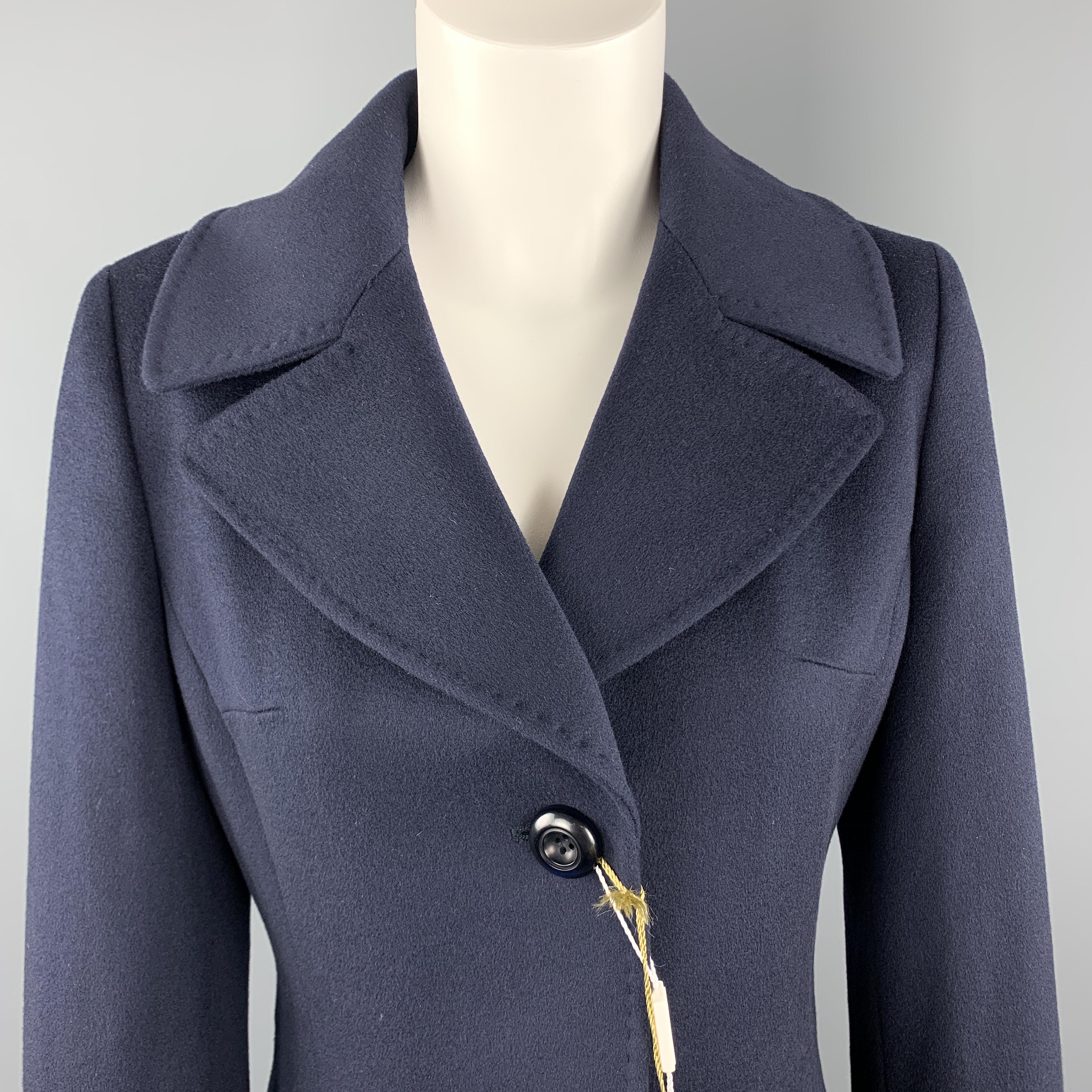 LORO PIANA long coat comes in a solid navy wool material, with a peak lapel, three buttons at closure, slit pockets, a belt at back, sid events, and buttoned cuffs. Made in italy. 

New With Tags. 
Marked: IT 42

Measurements:

Shoulder: 15 in.