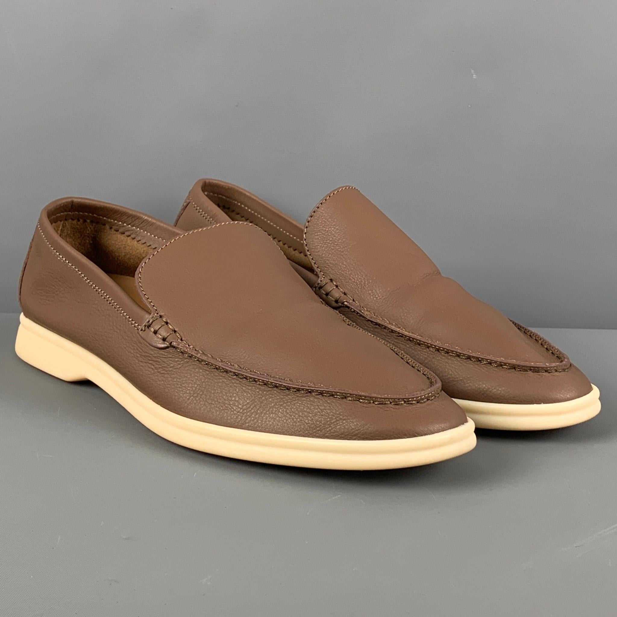 LORO PIANA loafers comes in a brown leather featuring a slip on style and a rubber sole. Made in Italy. 

Excellent Pre-Owned Condition.
Marked: 41

Outsole:11.25 in. x 4 in.