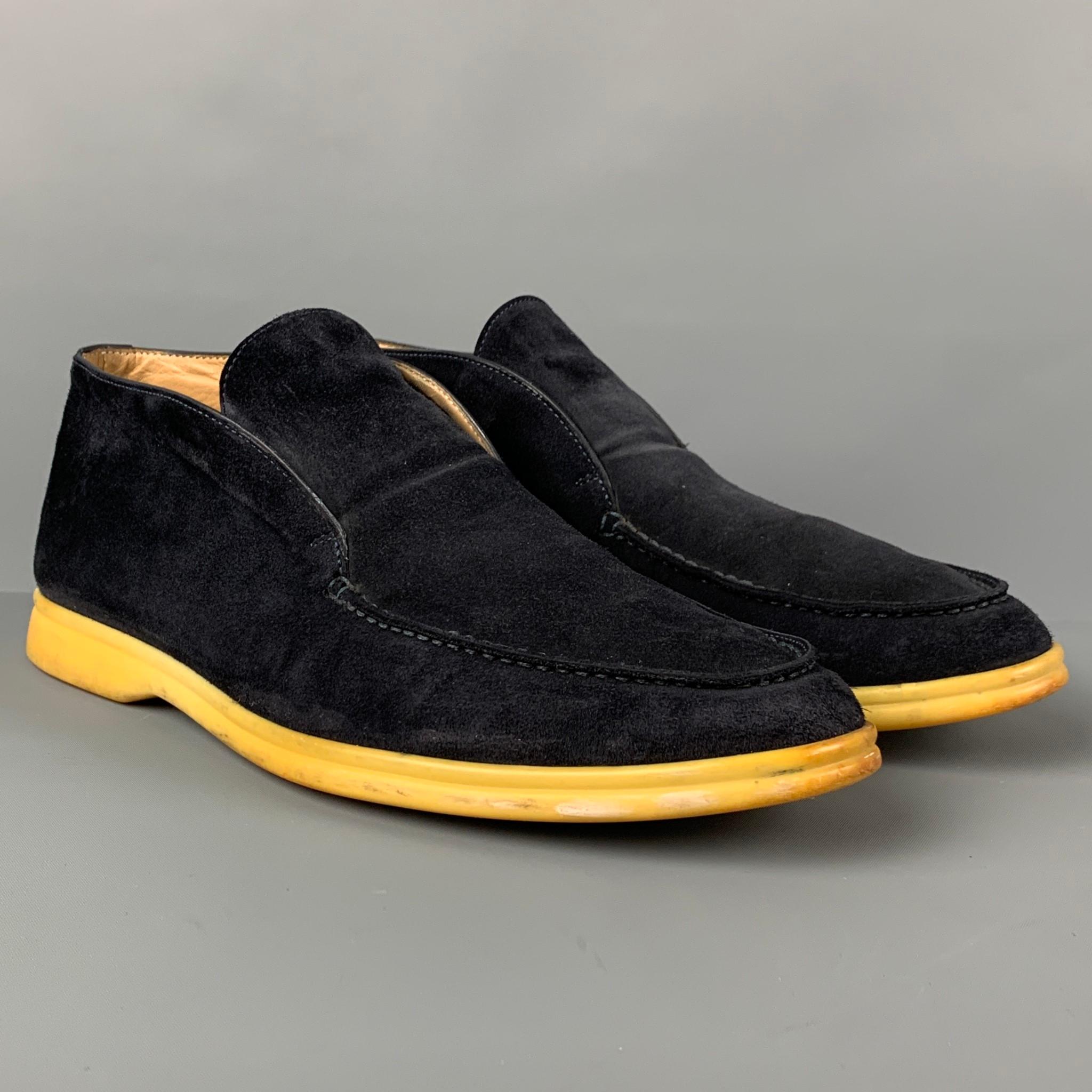 LORO PIANA boots comes in a navy suede with a yellow rubber sole featuring a chukka style. Made in Italy.

Very Good Pre-Owned Condition.
Marked: 42.5
Original Retail Price: $1,050.00

Measurements:

Length: 11.5 in.
Width: 4 in.
Height: 3 in. 
