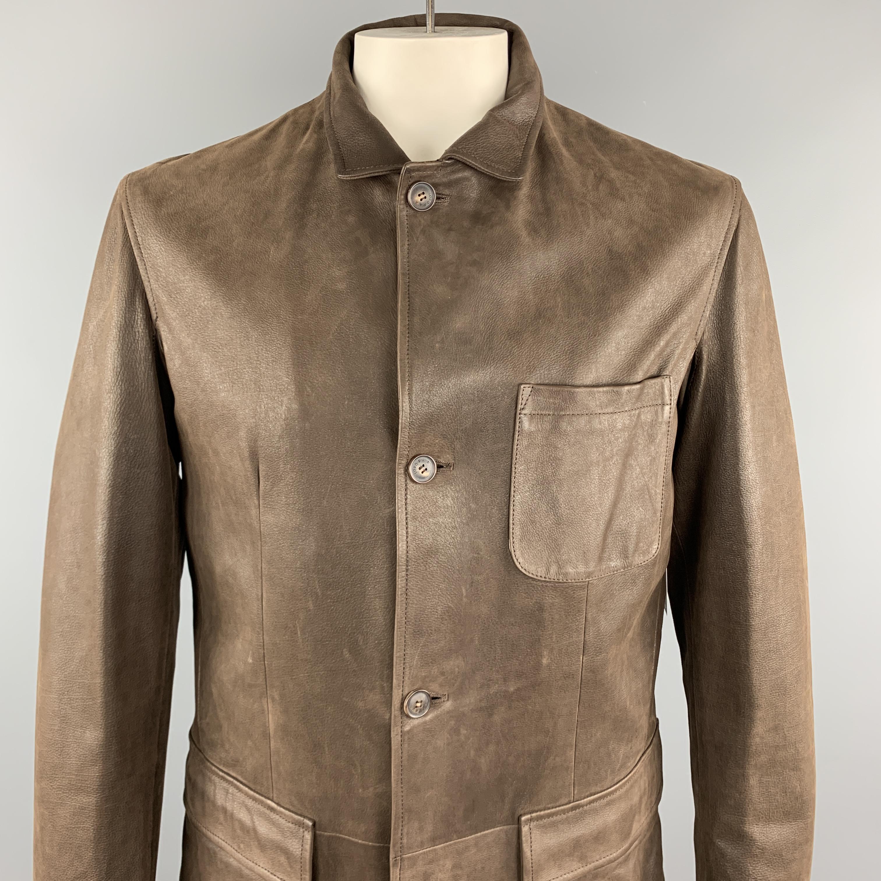 LORO PIANA Jacket comes in a brown calf skin featuring a cashmere lining, patch pockets, and a buttoned closure. Made in Italy. 

New With Tags.
Marked: L

Measurements:

Shoulder: 19 in. 
Chest: 44 in. 
Sleeve: 26 in. 
Length: 30.5 in. 