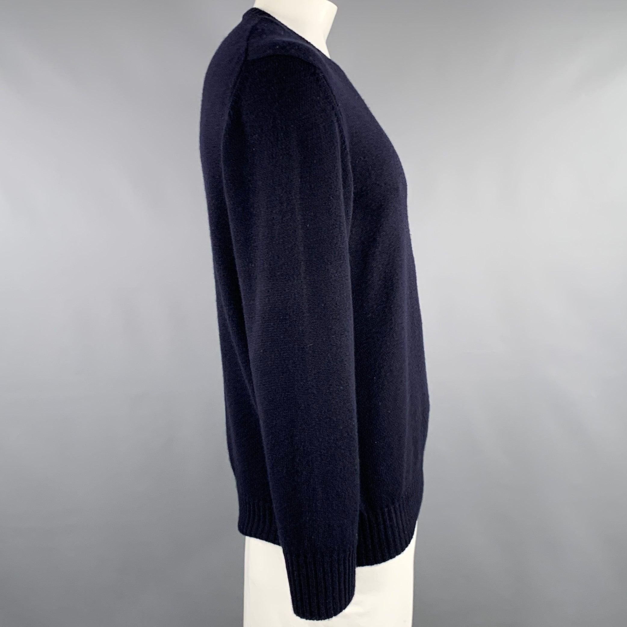 LORO PIANA sweater
in a navy cashmere knit featuring long sleeves and crew neck. Made in Italy.Very Good Pre-Owned Condition. Minor signs of wear. 

Marked:   IT 52 

Measurements: 
 
Shoulder: 19 inches Chest: 45 inches Sleeve: 25.5 inches Length: