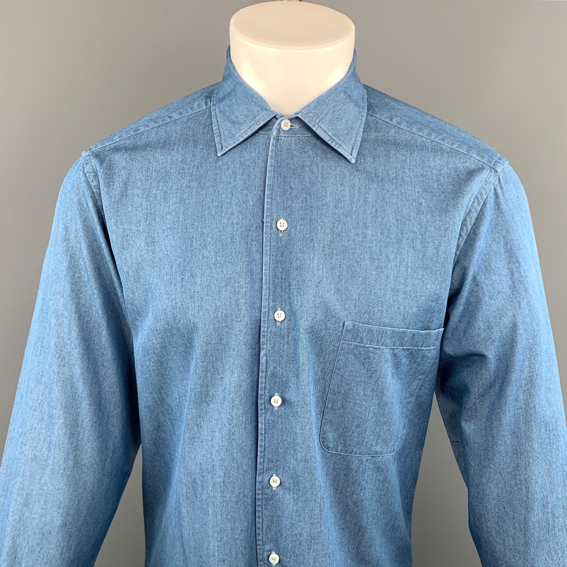 LORO PIANA long sleeve shirt comes in a indigo cotton featuring a button up style, spread collar, and a front patch pocket. Made in Italy.
 
Excellent Pre-Owned Condition.
Marked: M
 
Measurements:
 
Shoulder: 17 in.
Chest: 43 in.
Sleeve: 26.5