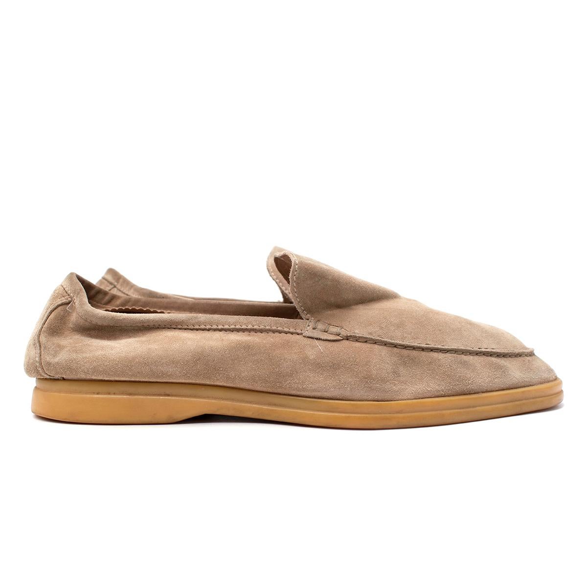 Loro Piana Summer Walk Beige Suede Loafers

-Sandstone suede and feature topstitched detailing and cushioned rubber soles.
-Slight heel
-Slip on 

Materials 
Suede 
Rubber 

31cm length
11cm width
2.5cm heel

Made in Italy 

