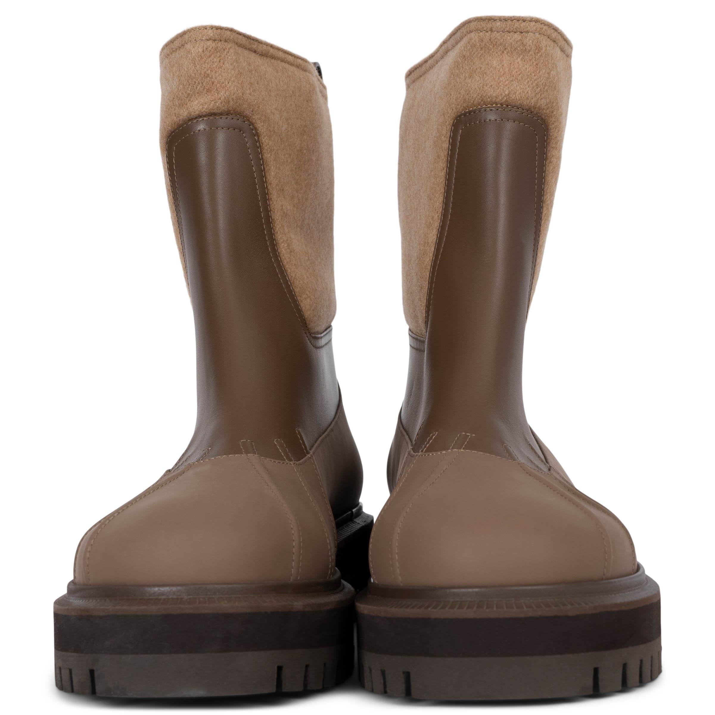 These 100% authentic Loro Piana Regent ankle boots are crafted from beige cashmere, treated with Storm System® for water-repellent protection, and feature two-tone taupe leather. Designed with a leather tab on the back for easy pull-on, round toes,