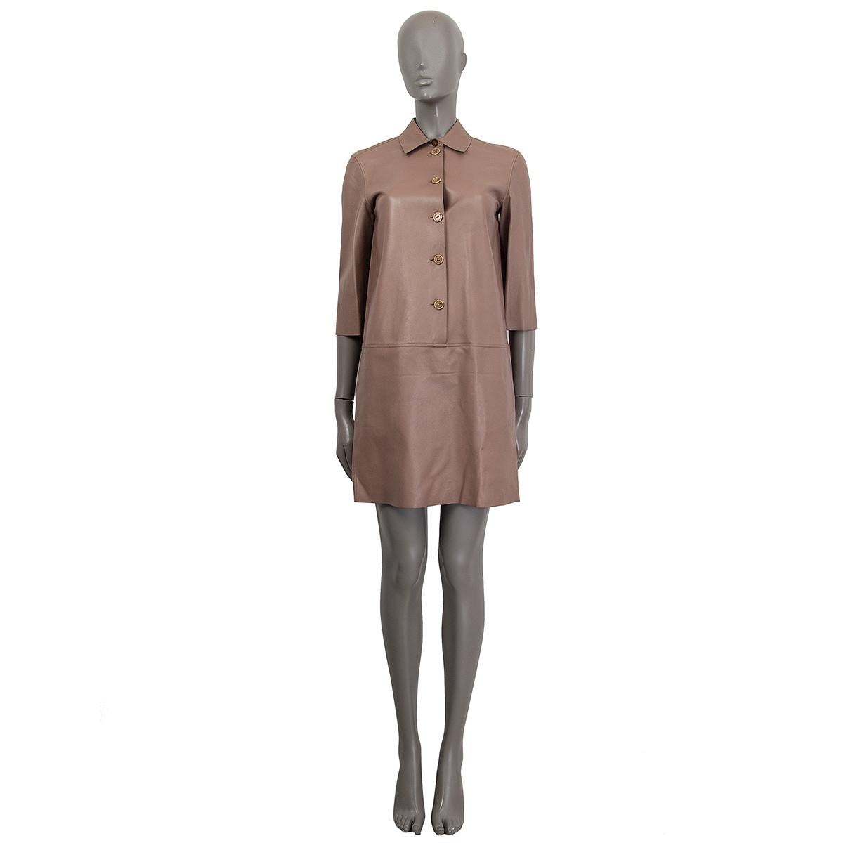 100% authentic Loro Piana shirt-dress in taupe leather with 3/4 sleeves. Opens with buttons on the front. Unlined. Has been worn and is in excellent condition.

Measurements
Tag Size	38
Size	XS
Shoulder Width	40cm (15.6in)
Bust To	90cm