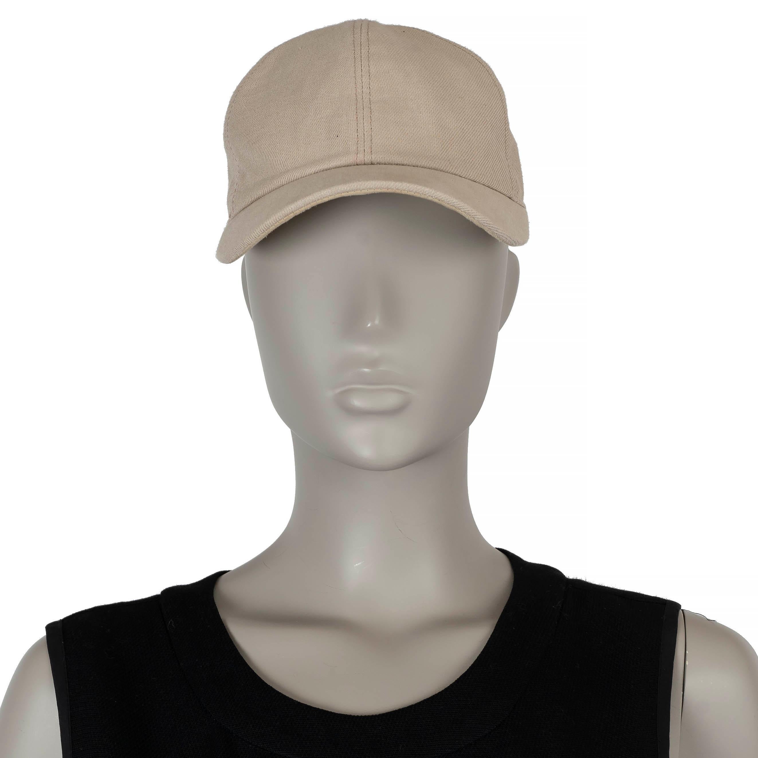 This 100% authentic Loro Piana baseball cap is crafted from taupe linen (100%) and features a luxurious suede visor lining for added elegance. It includes an adjustable Velcro strap for a customizable fit, blending casual style with Loro Piana's