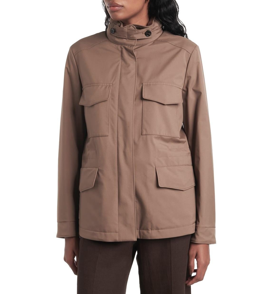 Permanent collection Loro Piana Traveller jacket. Bought for £2795 and unworn. Made from soft camel coloured nylon with a super soft cashmere lining. It has 4 roomy flap patch pockets with hidden zip sides, removable storm flap neckline, inner waist