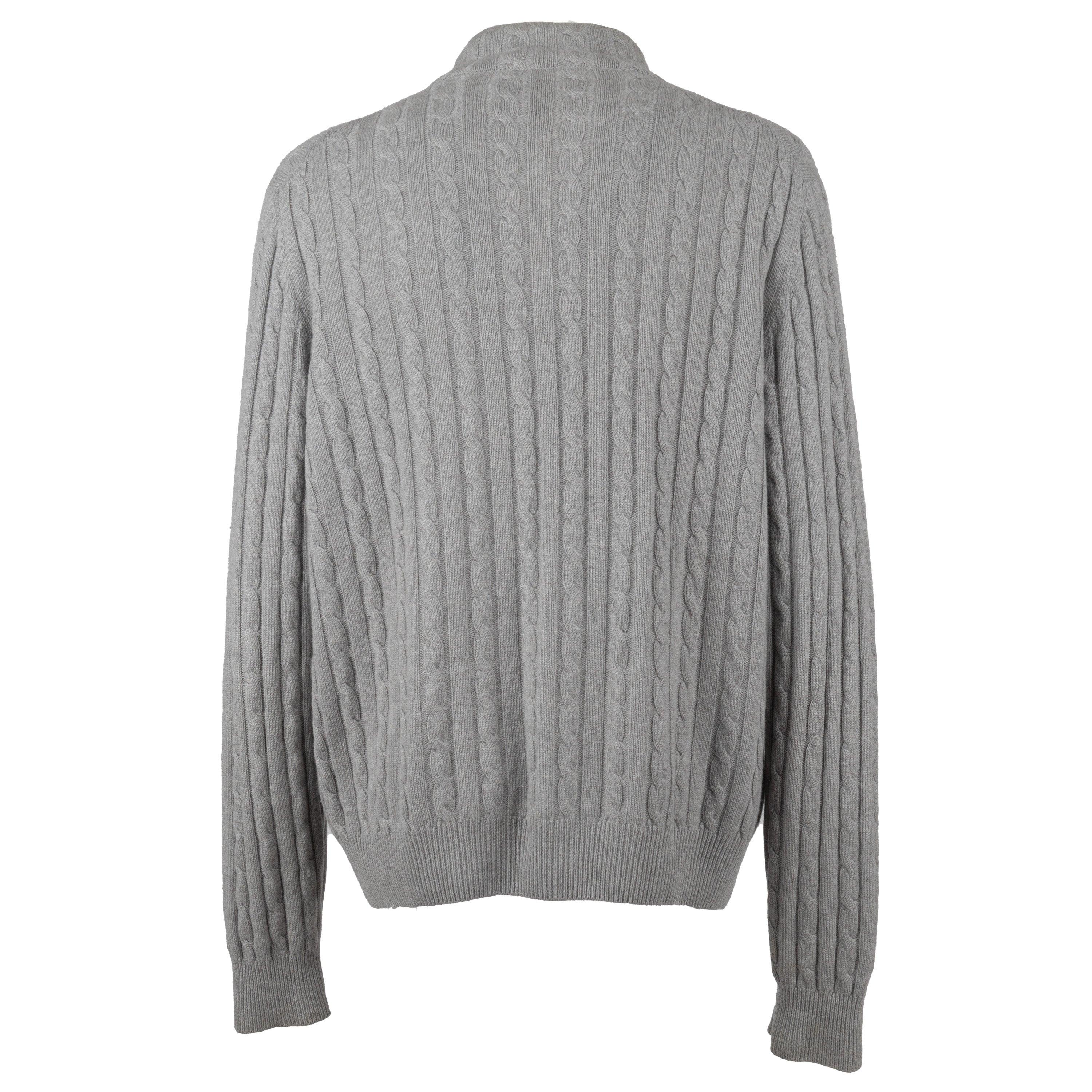 Crafted in Italy from a mélange of cashmere in grey, this sweater features braided texture. Known for the remarkable comfort and warmth, this classic sweater from Loro Piana is perfect for sleeping cozy this winter.
 Remarks: There are some