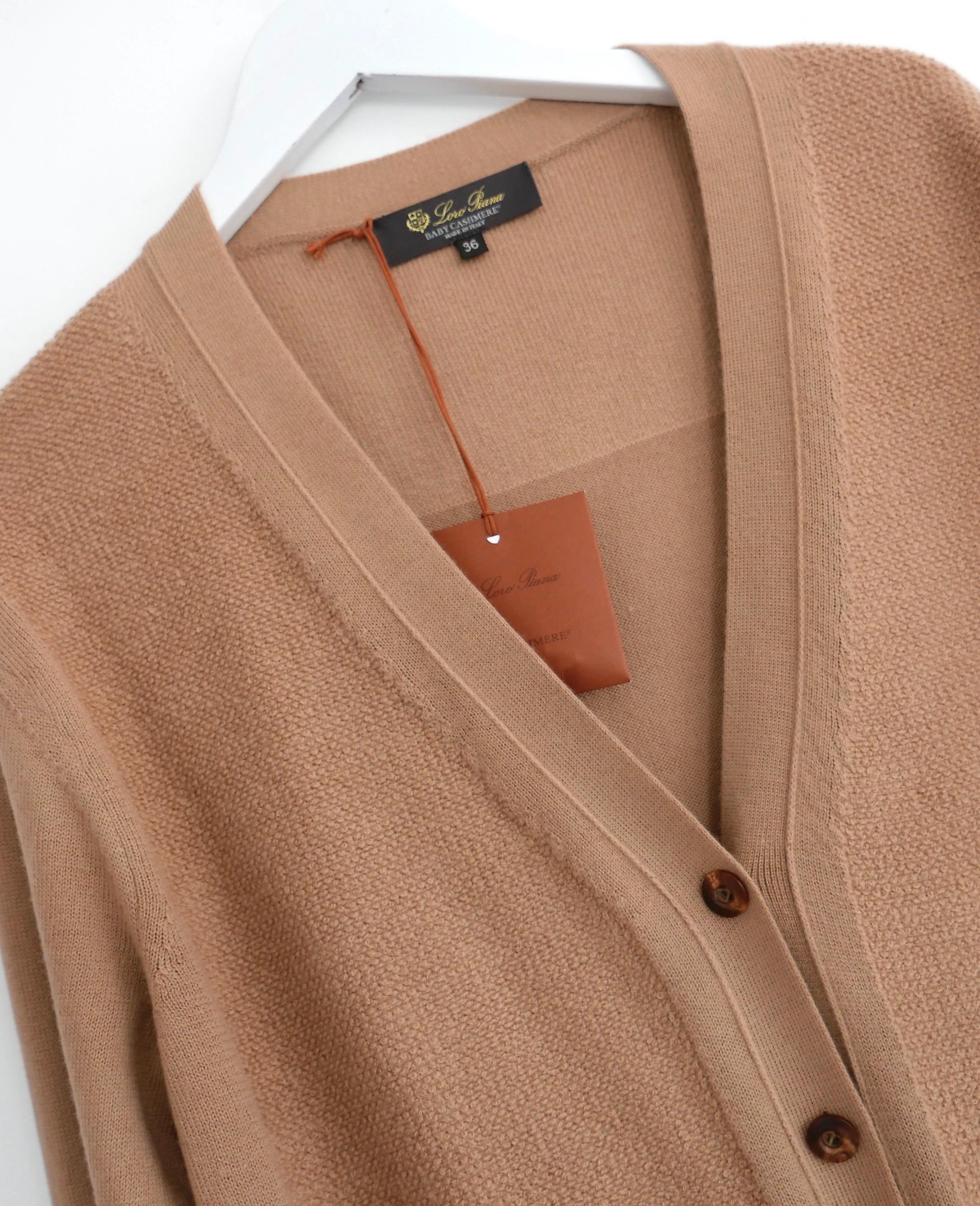 Gorgeous, super luxe Loro Piana Wetherlam baby  cashmere cardigan jacket. Bought for £2250 and new with tag/spare button and yarn. Made from incredibly soft, smooth knit camel brown baby cashmere with super tactile textured front panels and back