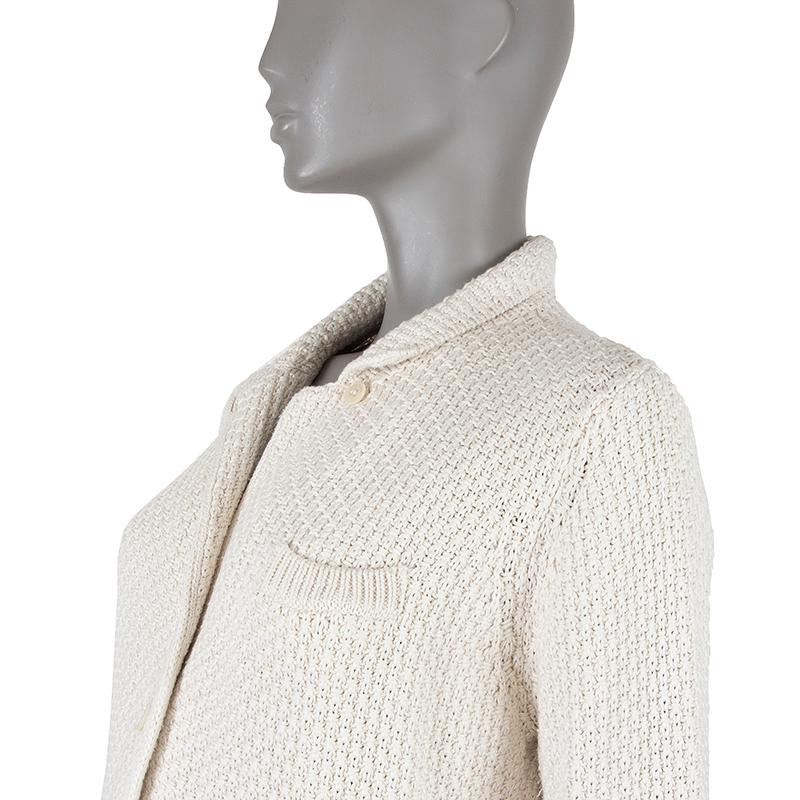 Loro Piana notch-collar cardigan in off-white cotton blend (assumed as tag is missing). With chest pocket and two patch pockets on the front. Closes with off-white buttons on the front. Has been worn and is in excellent condition. 

Tag Size 48
Size