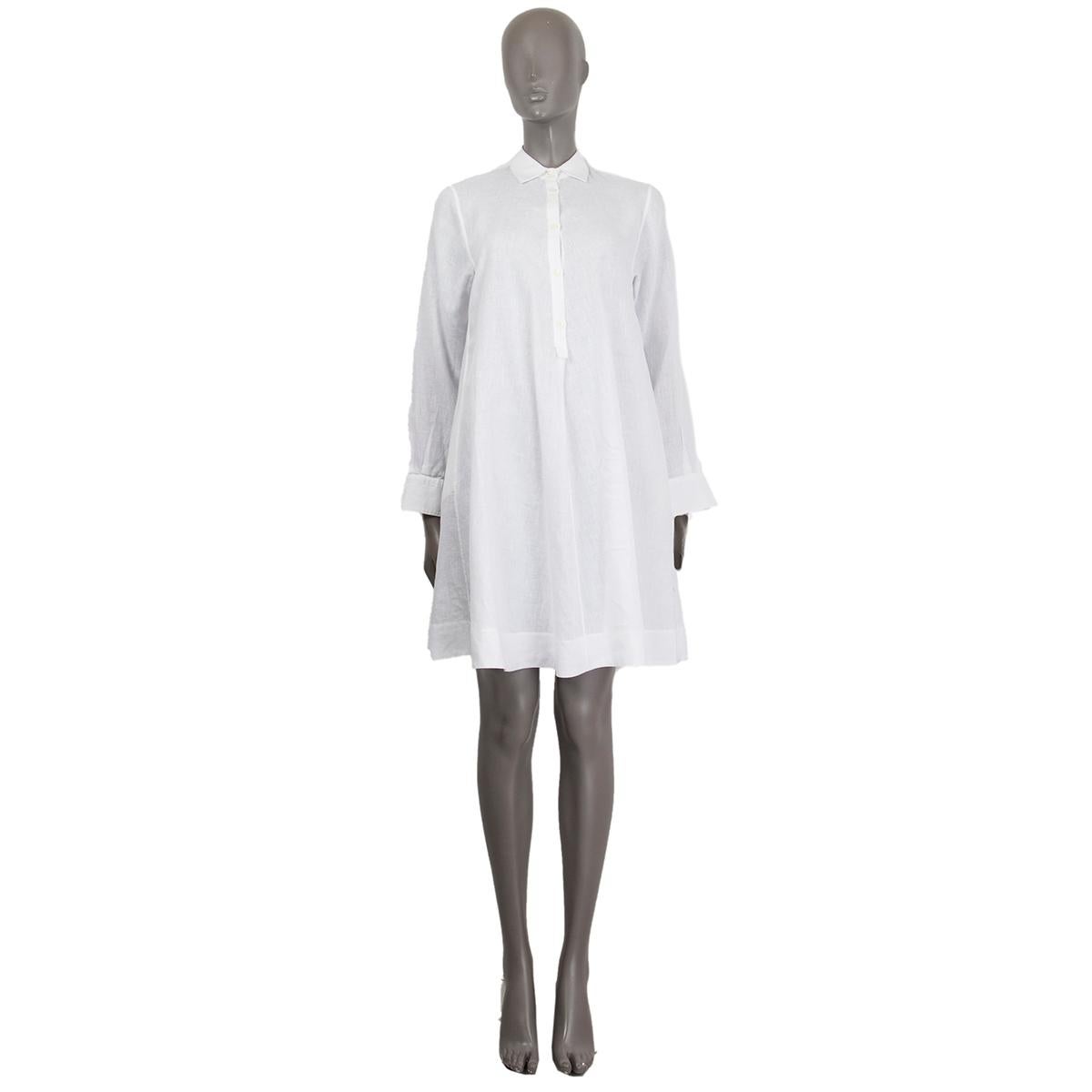 100% authentic Loro Piana long sleeve shirt dress in white linen (100%) with a flat collar and pockets. Closes on the front with buttons. Unlined. Has been worn and is in excellent condition. 

Measurements
Tag Size	(Missing Tag) L
Size	L
Shoulder