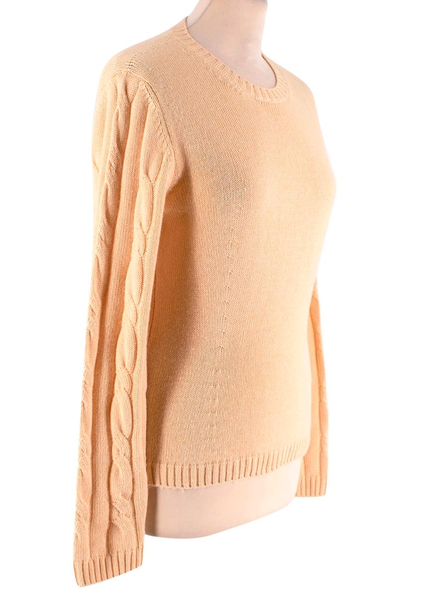 Loro Piana Yellow Silk & Cashmere Knit Sweater

- Luxurious silk and cashmere soft texture 
- Cable knit details to the sleeves 
- Gorgeous pastel yellow hue 
- Classic cut 
- Round neck 
- Ribbed cuffs and hem 
- Comfortable timeless design