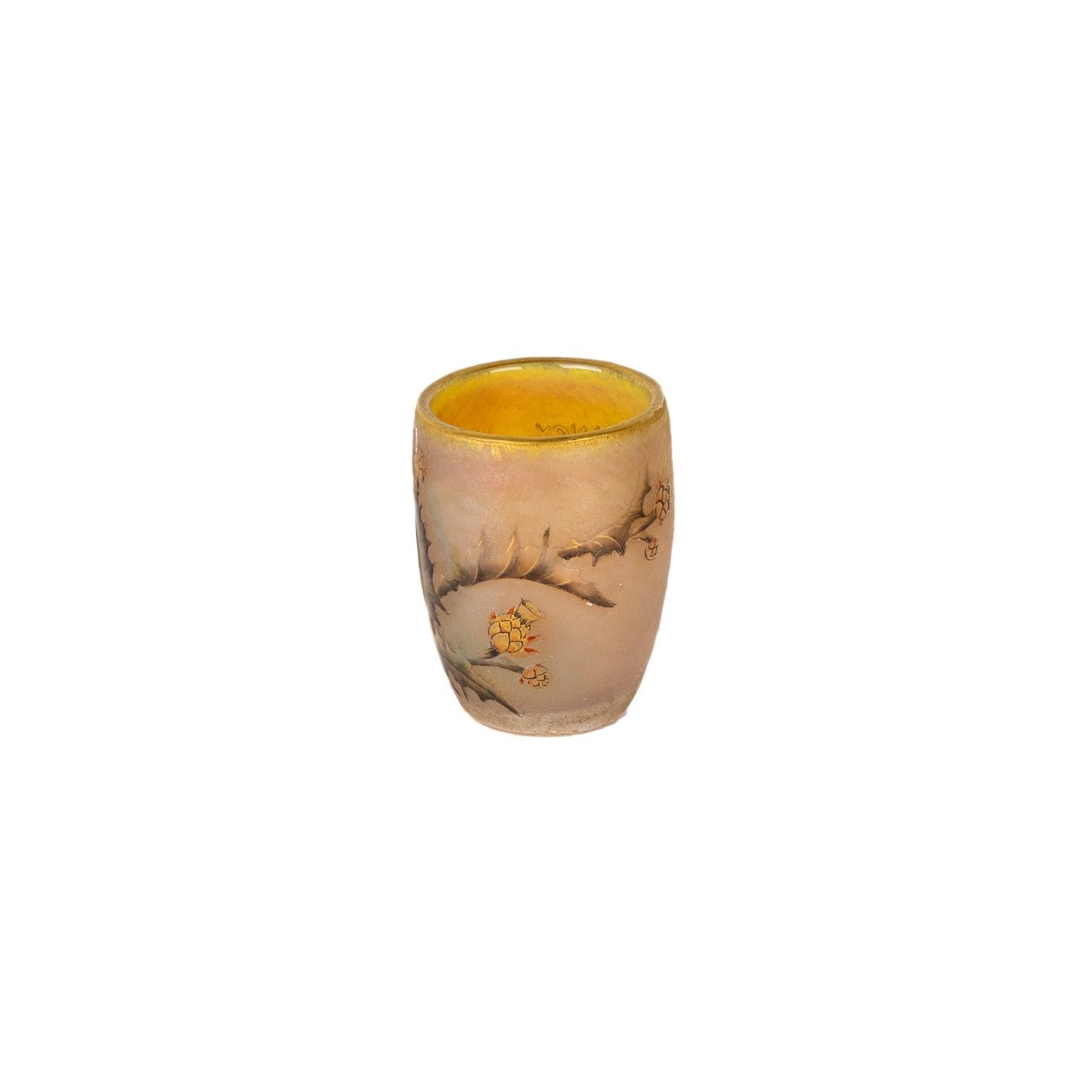 A multi-layered glass proof chalice / goblet with acid-etched and polychrome enameled decoration on a yellow shaded background with signed «Nancy», the Cross of Lorraine and the mark “1906” of the date.
