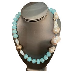 LB offers one of a kind baroque pearl and adventuring handmade necklace