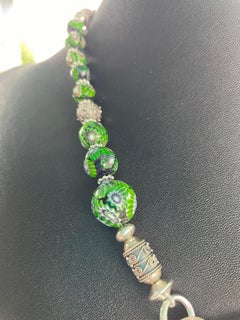 Lorraine’s Bijoux presents a one of a kind Art Deco pendant on Venetian beads