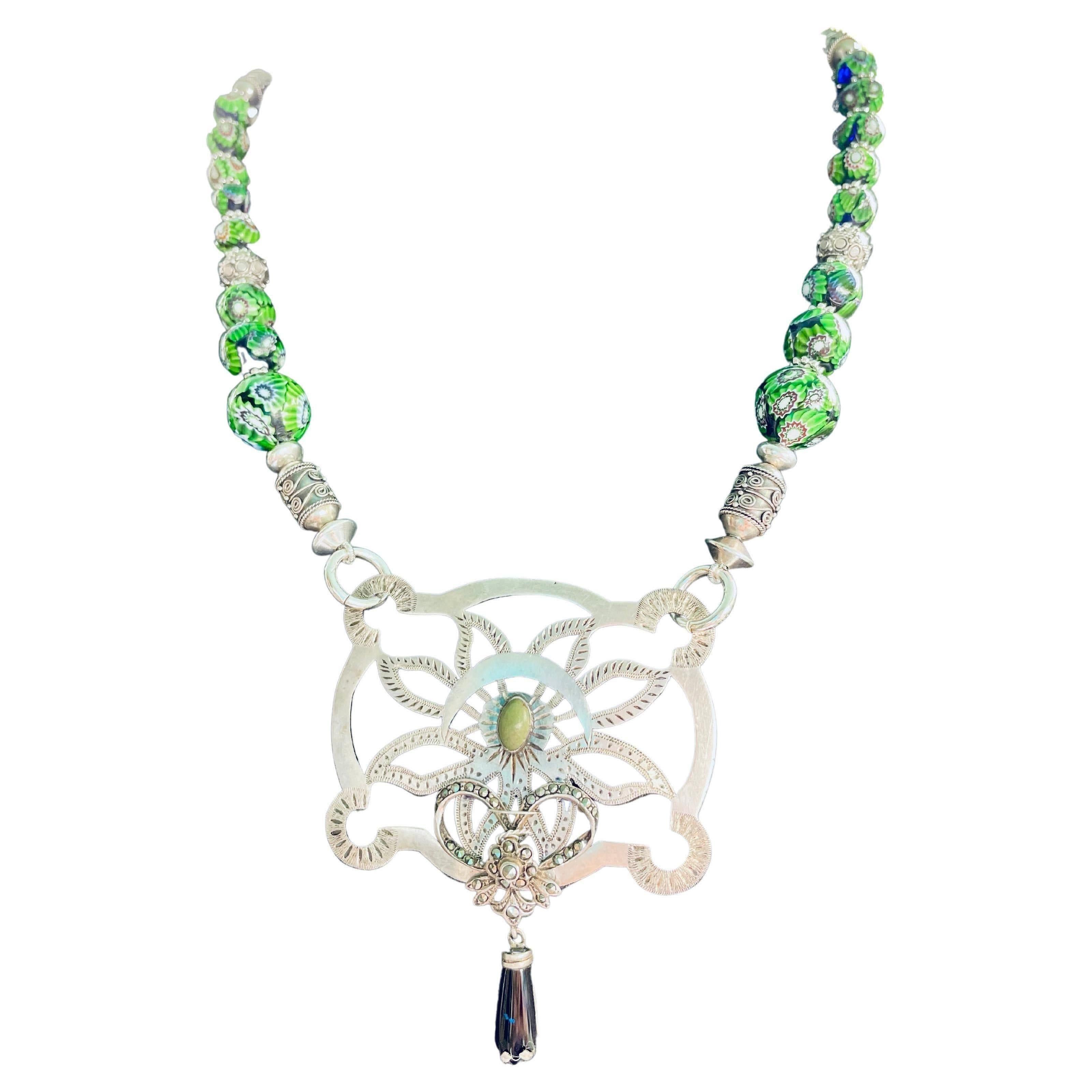 Lorraine’s Bijoux presents a one of a kind Art Deco pendant on Venetian beads For Sale