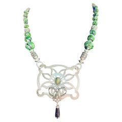 Lorraine’s Bijoux presents a one of a kind Art Deco pendant on Venetian beads
