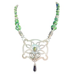 Lorraine’s Bijoux presents a one of a kind Art Deco pendant on Venetian beads