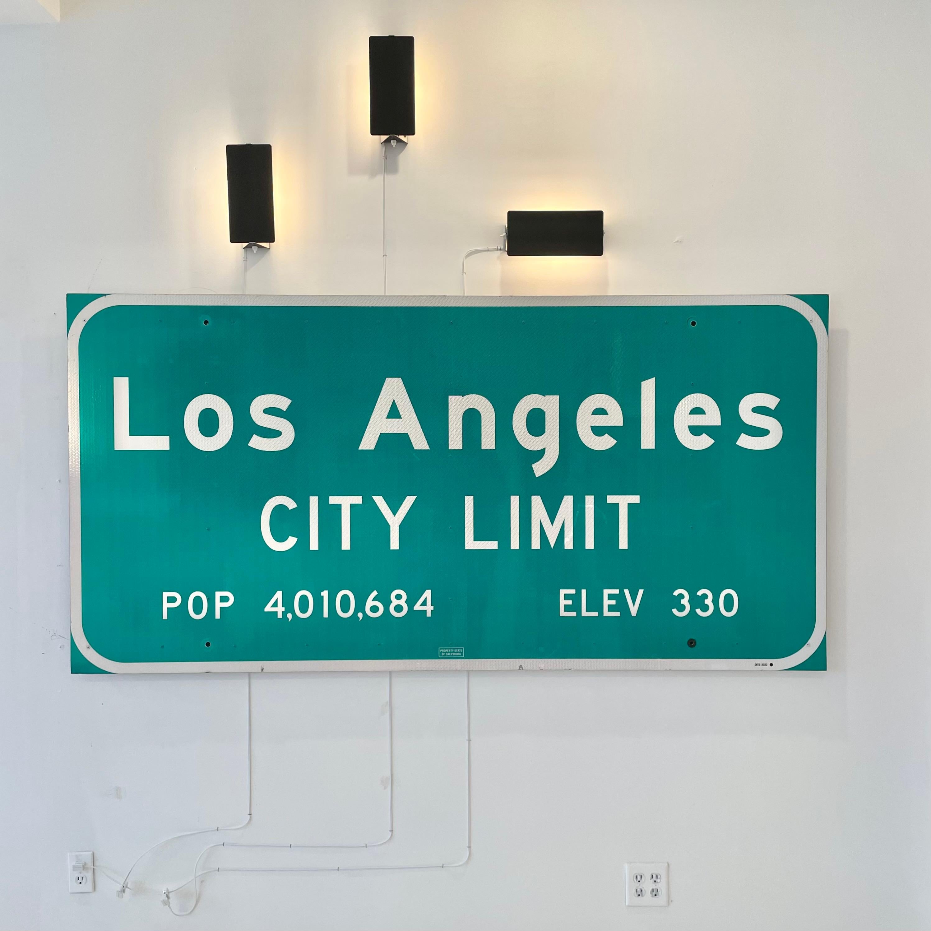 Amazing City of Los Angeles freeway sign. This sign welcomed you as you entered the city of Los Angeles. Reflective letters and border as well as a protective plastic sheet over the face. Stamped 