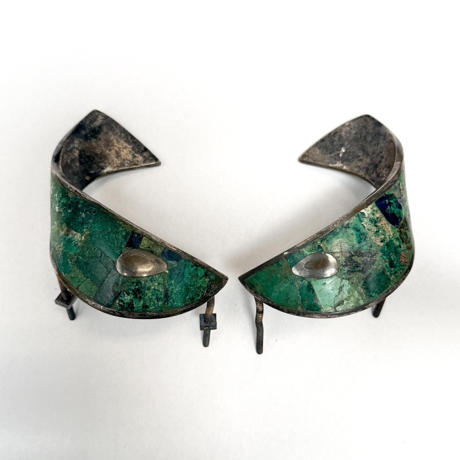 For your consideration a pair of pull handles by Los Castillo. Abstract Fish with malachite and silver. Mexico Circa the 1950s. 
Dimensions: 3.75 w x 3 h x .75 D

Please visit take a look at our listings, we have an amazing curated collection of