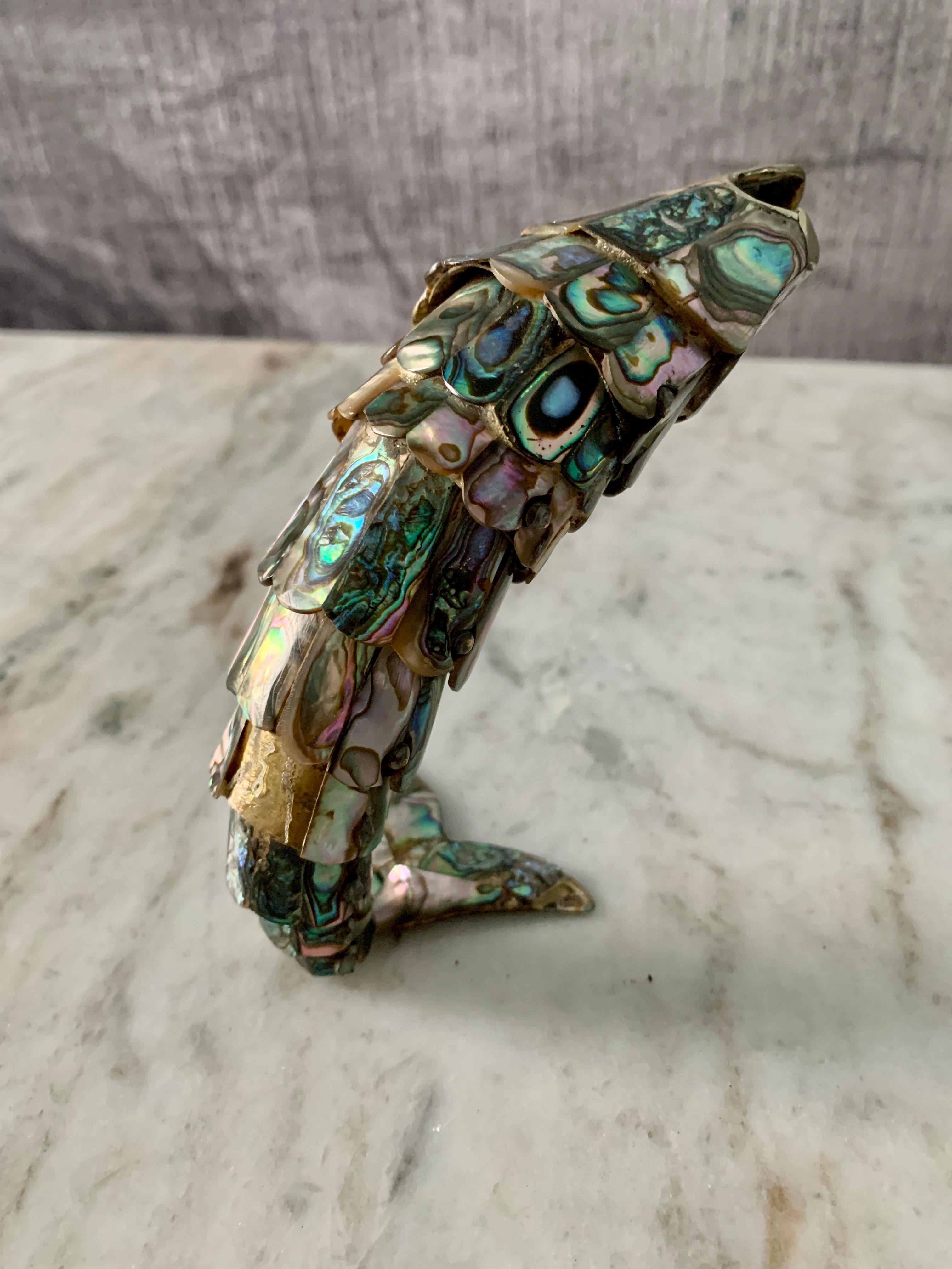 articulated fish bottle opener