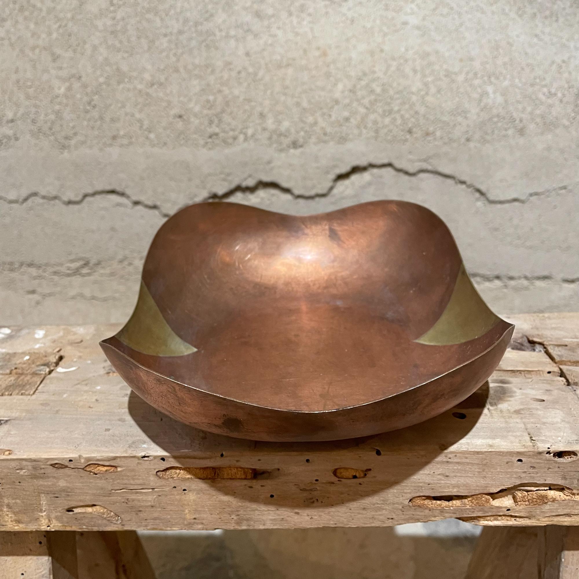 1960s Sculptural serving dish married metals stamped made in Mexico 
attributed to Los Castillo 
Brass and copper. 
Square shape subtle scalloped corners. 
6 width x 7 depth x 2.25 tall
Original vintage unrestored with vintage patina. 
Refer to